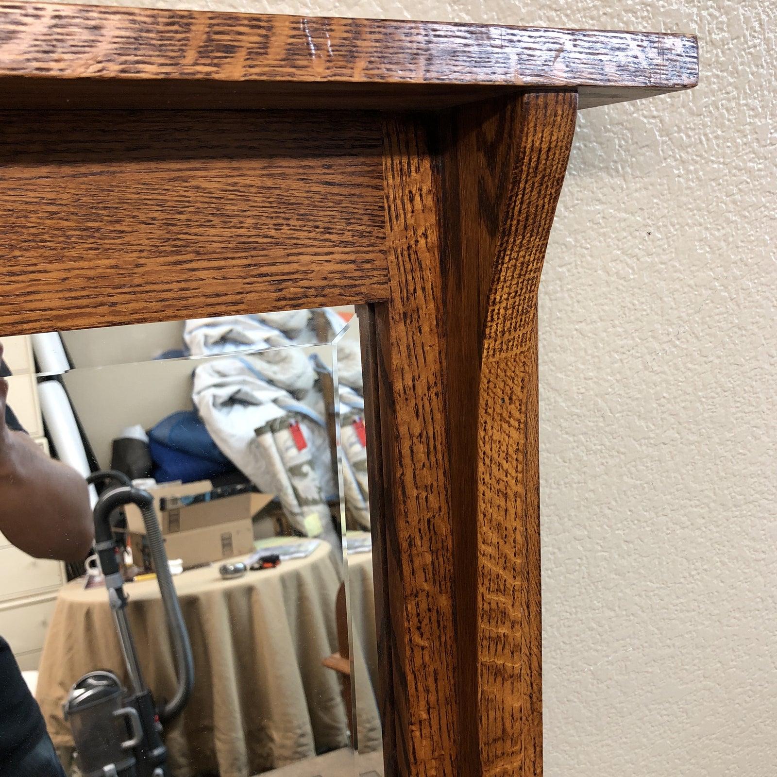We presents a large mission mirror by Michael's Furniture. Known for its quality construction, the large oak piece features dovetailed joinery, and classic Arts & Crafts details.

    