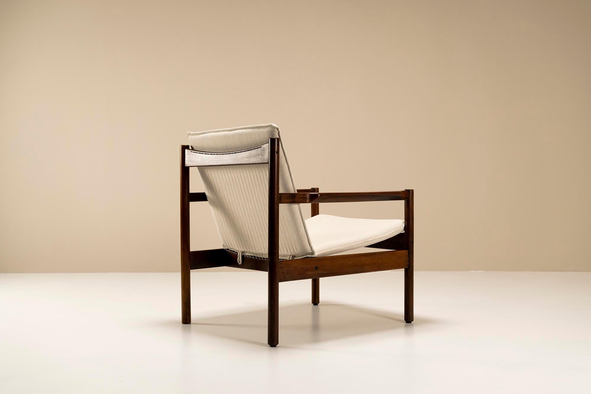 Upholstery Michel Arnoult Ouro Preto Lounge Chair in Imbuia Wood with Ottoman, Brasil 1958