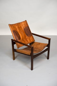 Michel Arnoult, "Peg-Lev" armchair, Solid noble wood and leather. c. 1960.