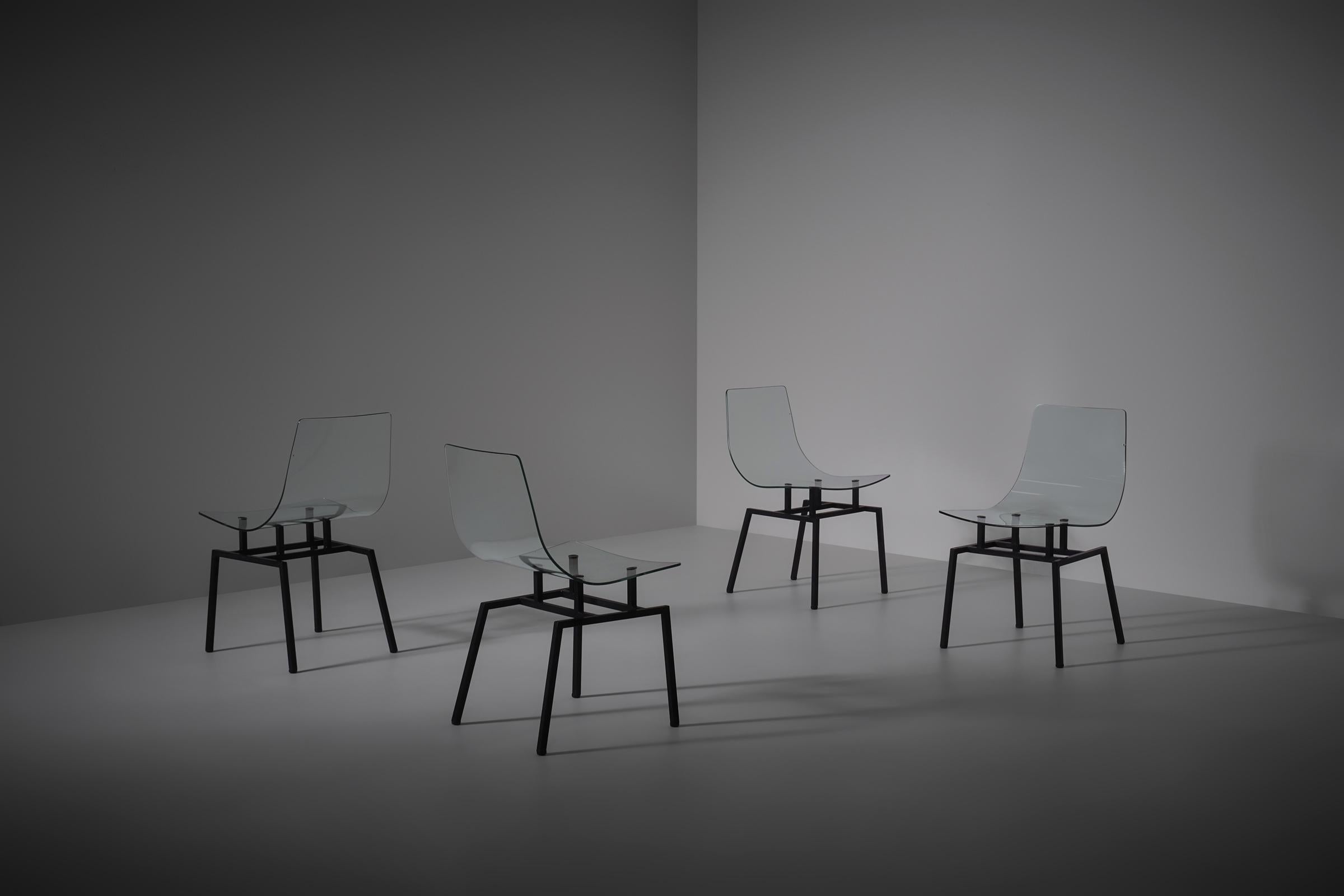 Rare set of four 'verre securit' chairs by Michel Blondeau, France 1958. Very experimental and revolutionary design in both shape and used material. This is a highly uncommon model with special square bases which makes a stunning contrast with the