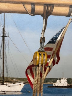 "Alabama" Vineyard sailboat with American flag and sail in the foreground