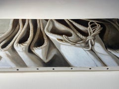 "Unravel" a realistic and close up view of the ship's sail folded and resting