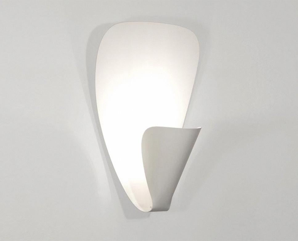 Wall sconce lamp model 'B206' designed by Michel Buffet in 1953.

The production of this re-edition lamps, wall lights and floor lamps are manufactured using craftsman’s techniques with the same materials and techniques as the first models. Each