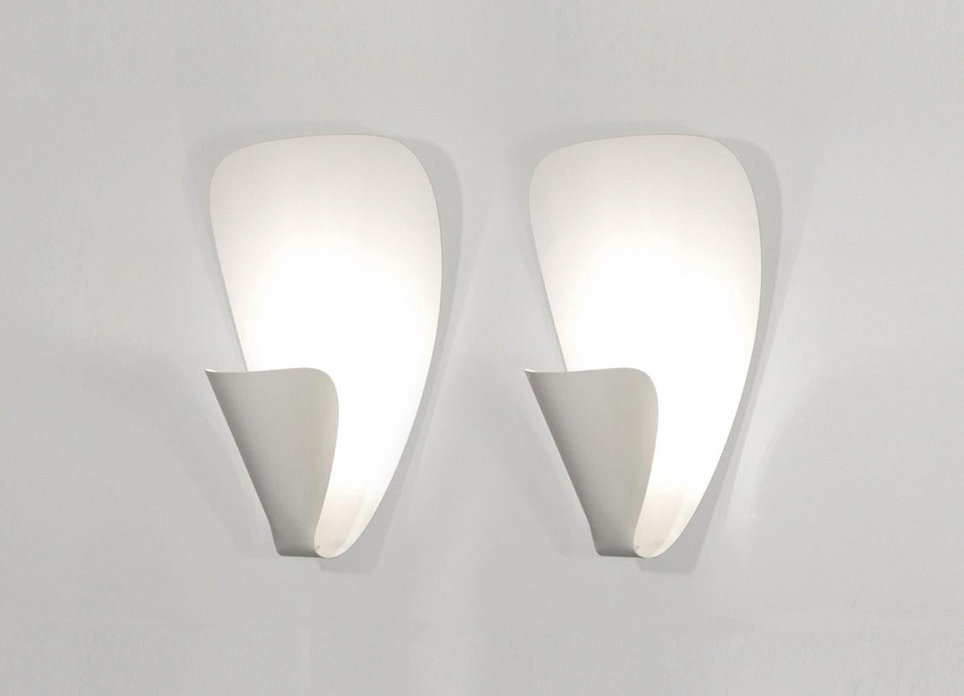 Wall sconce lamp model 'B206' designed by Michel Buffet in 1953.

The production of this re-edition lamps, wall lights and floor lamps are manufactured using craftsman’s techniques with the same materials and techniques as the first models. Each