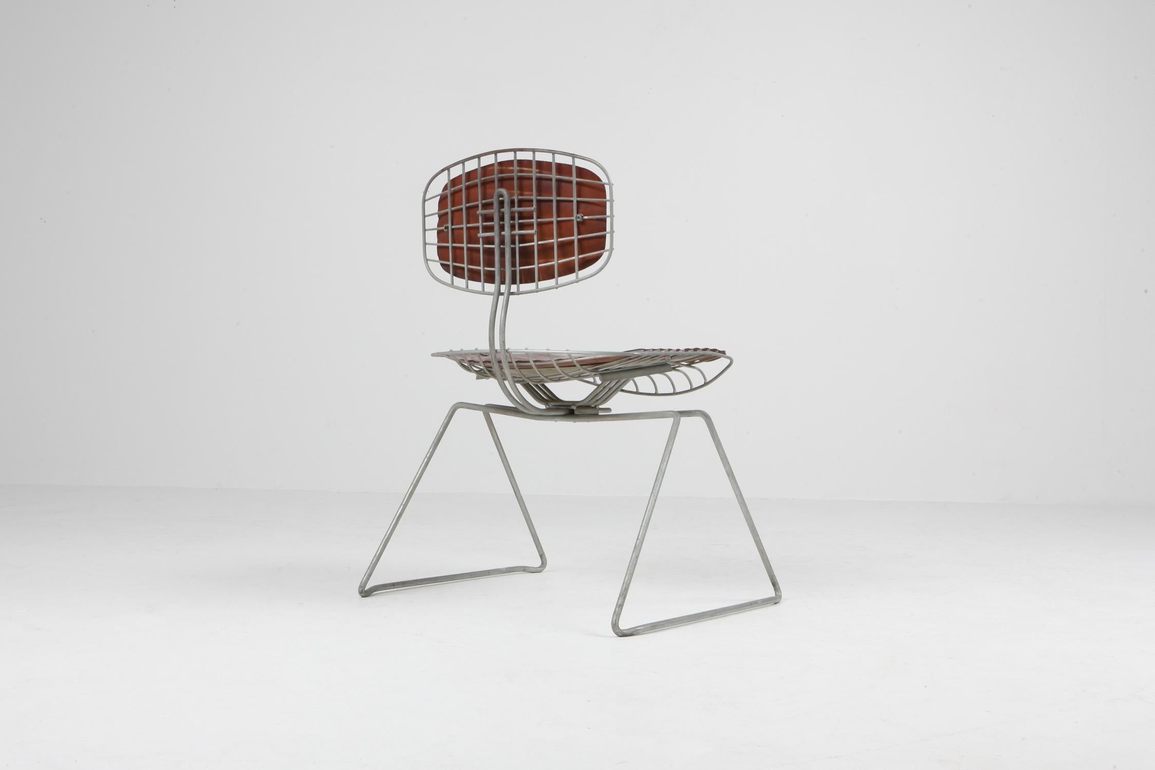 Beaubourg wire chairs by Michel Cadestin and Georges Laurent.
These chairs were designed in 1976 for the competition to determine which chairs would be used in the Centre Pompidou art center. Jean Prouvé was the head of the committee that