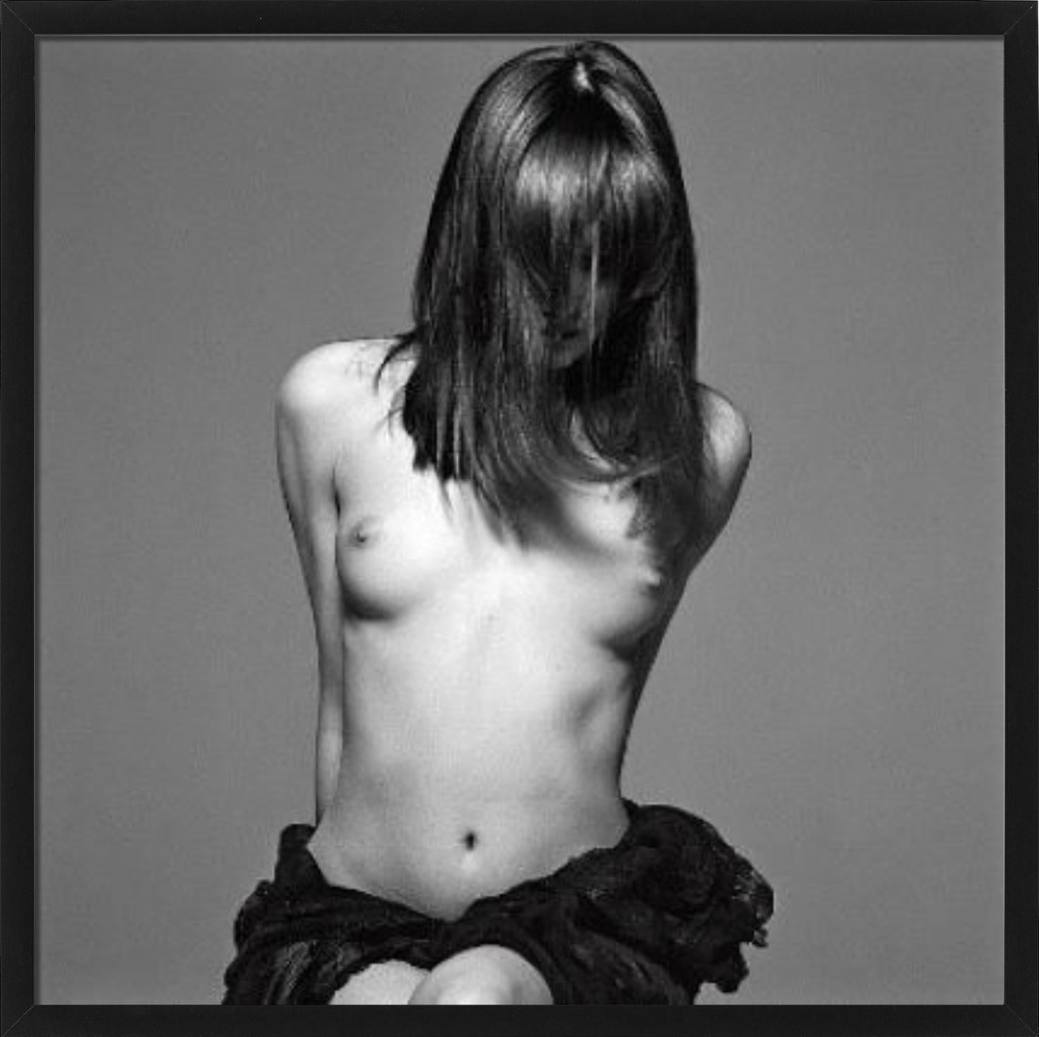 Carla Bruni, Safe Sex Campaign - the nude supermodel in a black skirt - Photograph by Michel Comte