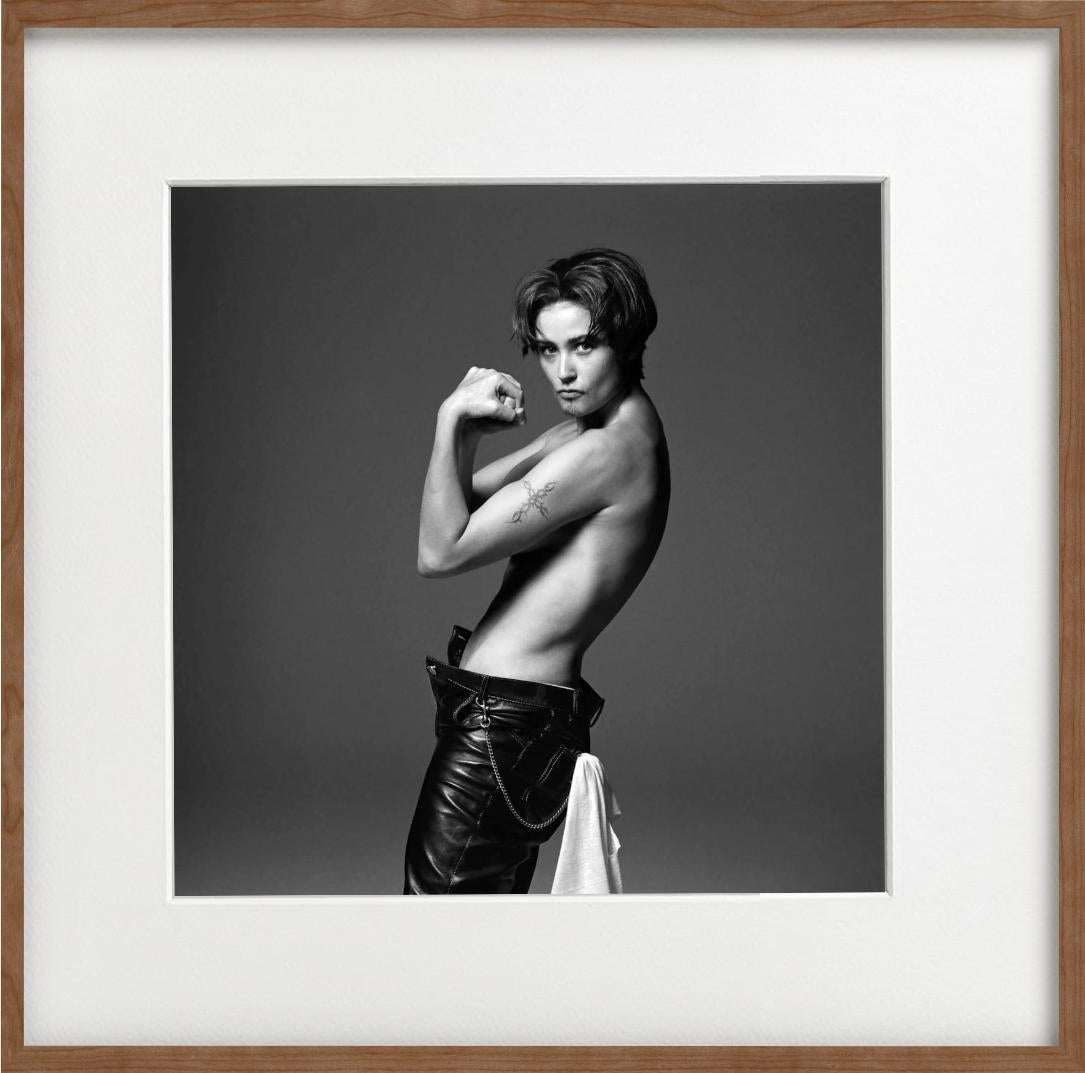 Demi Moore - model posing topless in leather pants, black-and-white photograph - Black Portrait Photograph by Michel Comte