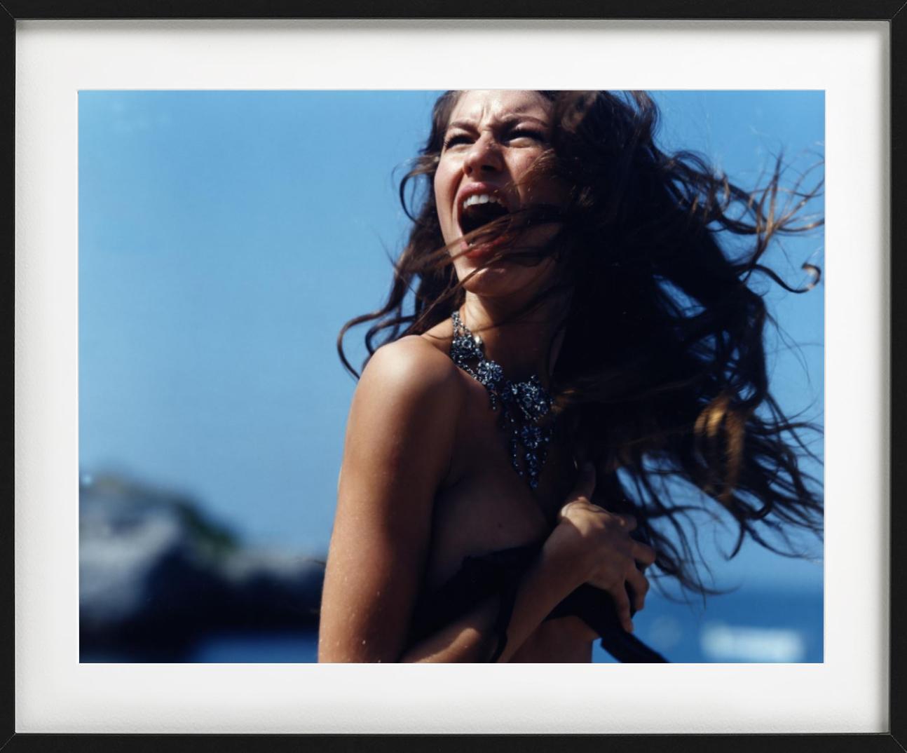 Gisele Buendchen Screaming, Cannes - the naked supermodel standing against sky - Photograph by Michel Comte