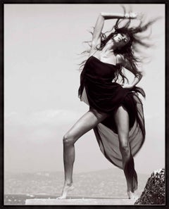 Gisele Buendchen - the naked supermodel in a black dress, wind blowing in Cannes