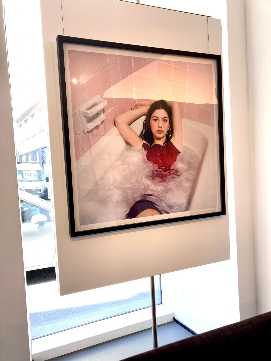 Sofia Coppola - the regisseur and actress lying in a bath tube with dress on - Contemporary Photograph by Michel Comte