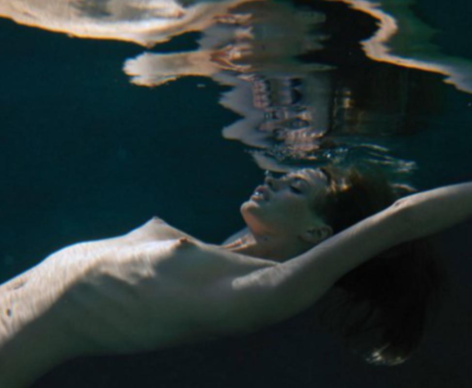 Underwater Nude with reflection on the surface, photographed by Michel Comte in

All prints are limited edition. Available in multiple sizes. High-end framing on request.

All prints are done and signed by the artist. The collector receives an