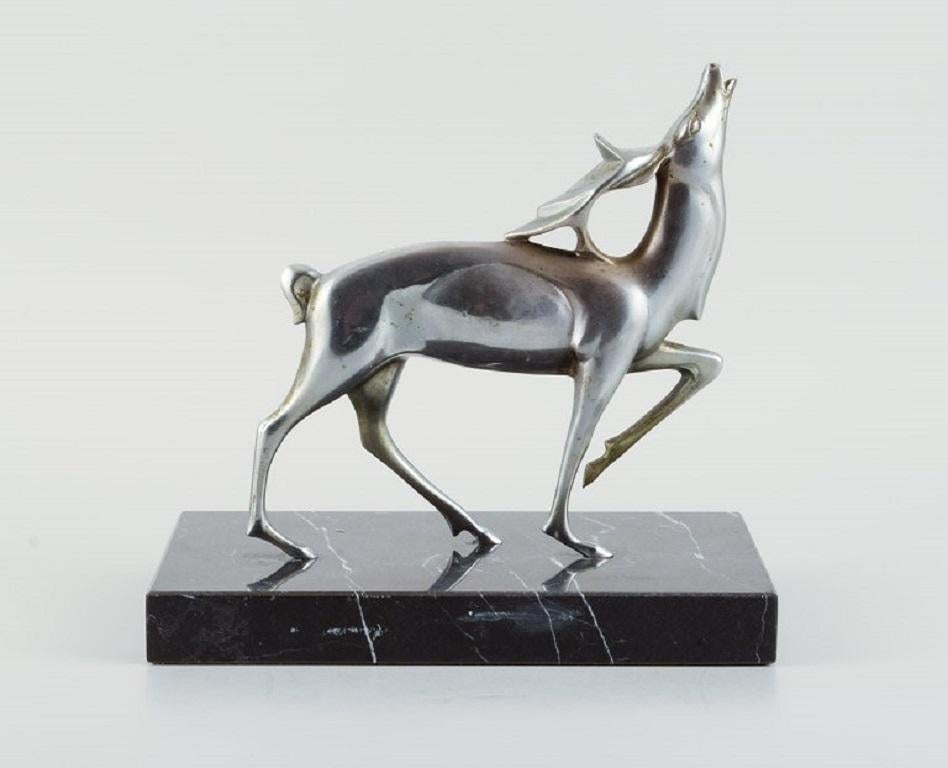 Michel Decoux, (1837-1924),a Belgian sculptor.
Art Deco sculpture of a roaring stag in silver-patinated bronze on a black marble base.
1910/1920s.
Marked.
In excellent condition with a beautiful patina.
Measurements: H 24.5 cm x L 25.0 cm. x W
