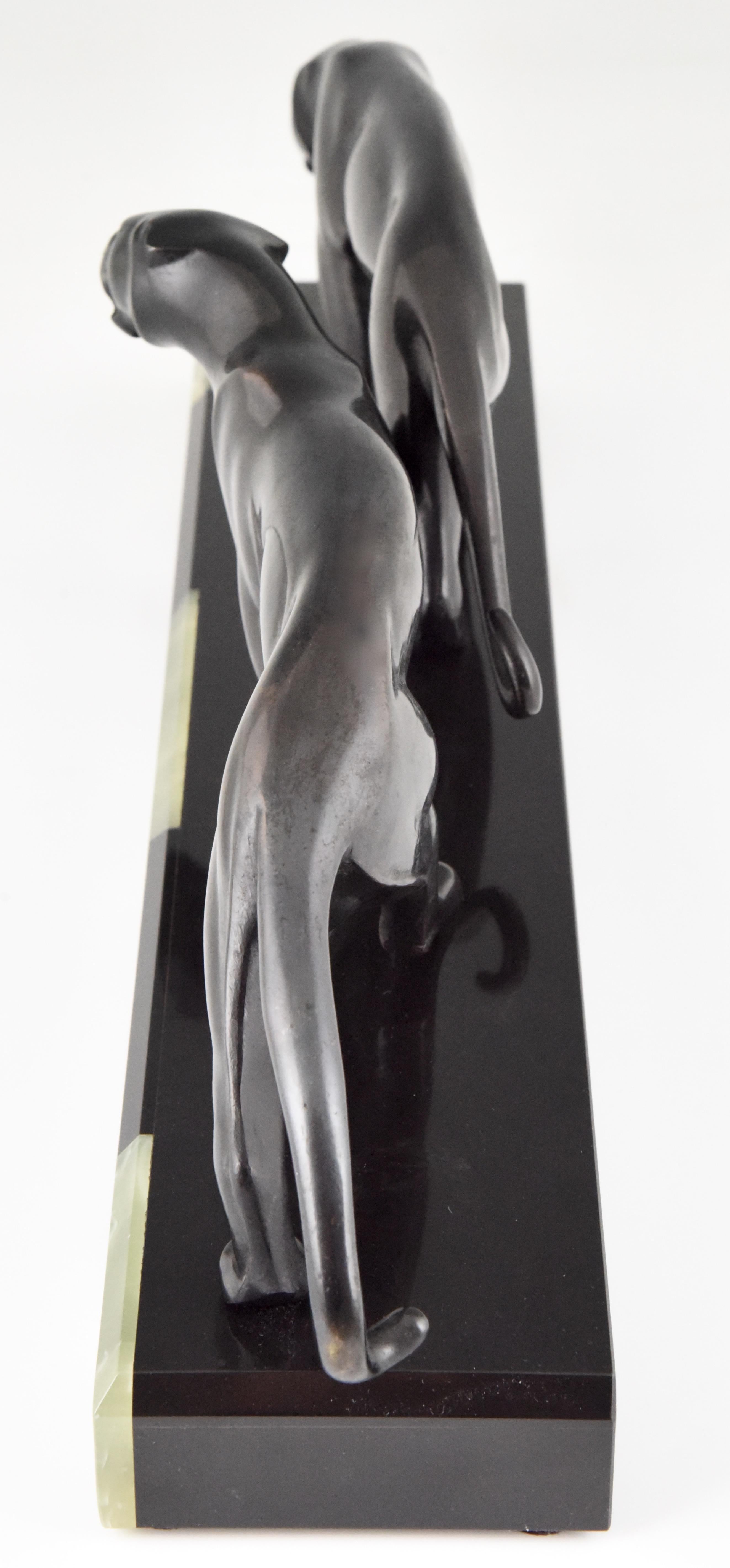 Bronze Deux panthères, sculpture en bronze Art Déco de Michel Decoux, France, 1920