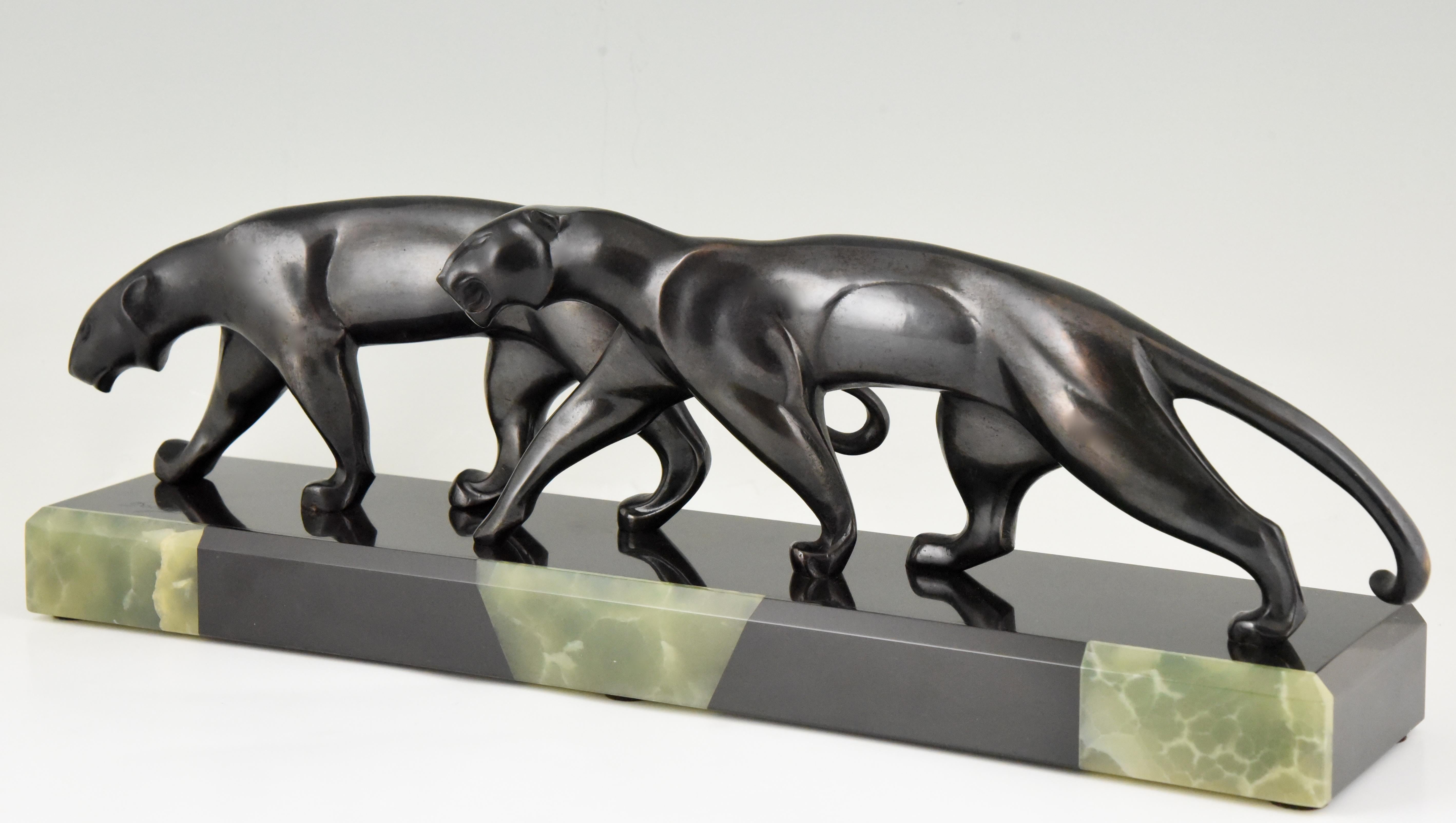 Deux panthères, sculpture en bronze Art Déco de Michel Decoux, France, 1920 1