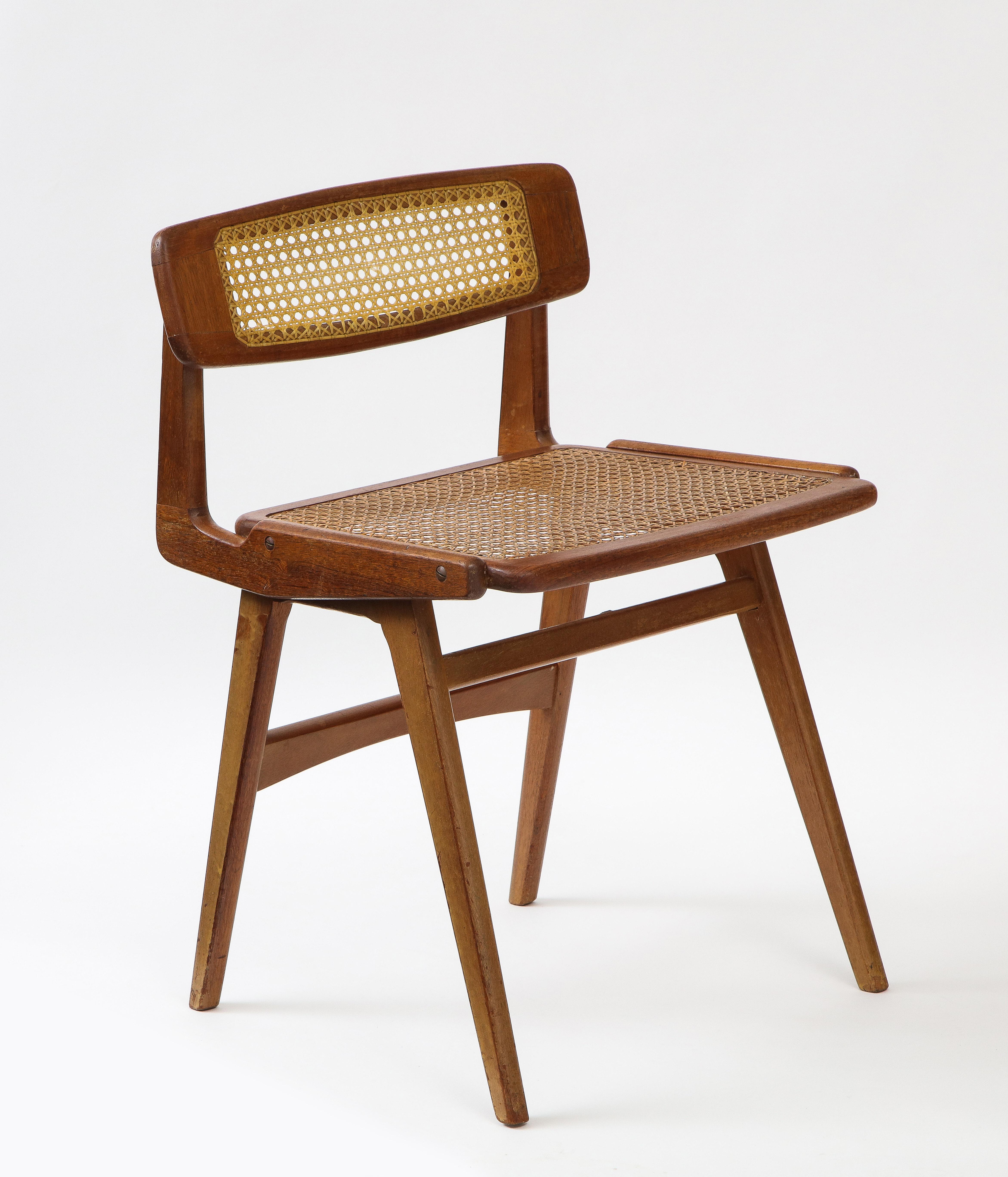 Often wrongly attributed to Landault this is a rare chair from Michel Ducaroy for a company which eventually became Ligne Roset. The use of cane and on the back upper part of the chair Nylon Cane was an experimental material at the time which