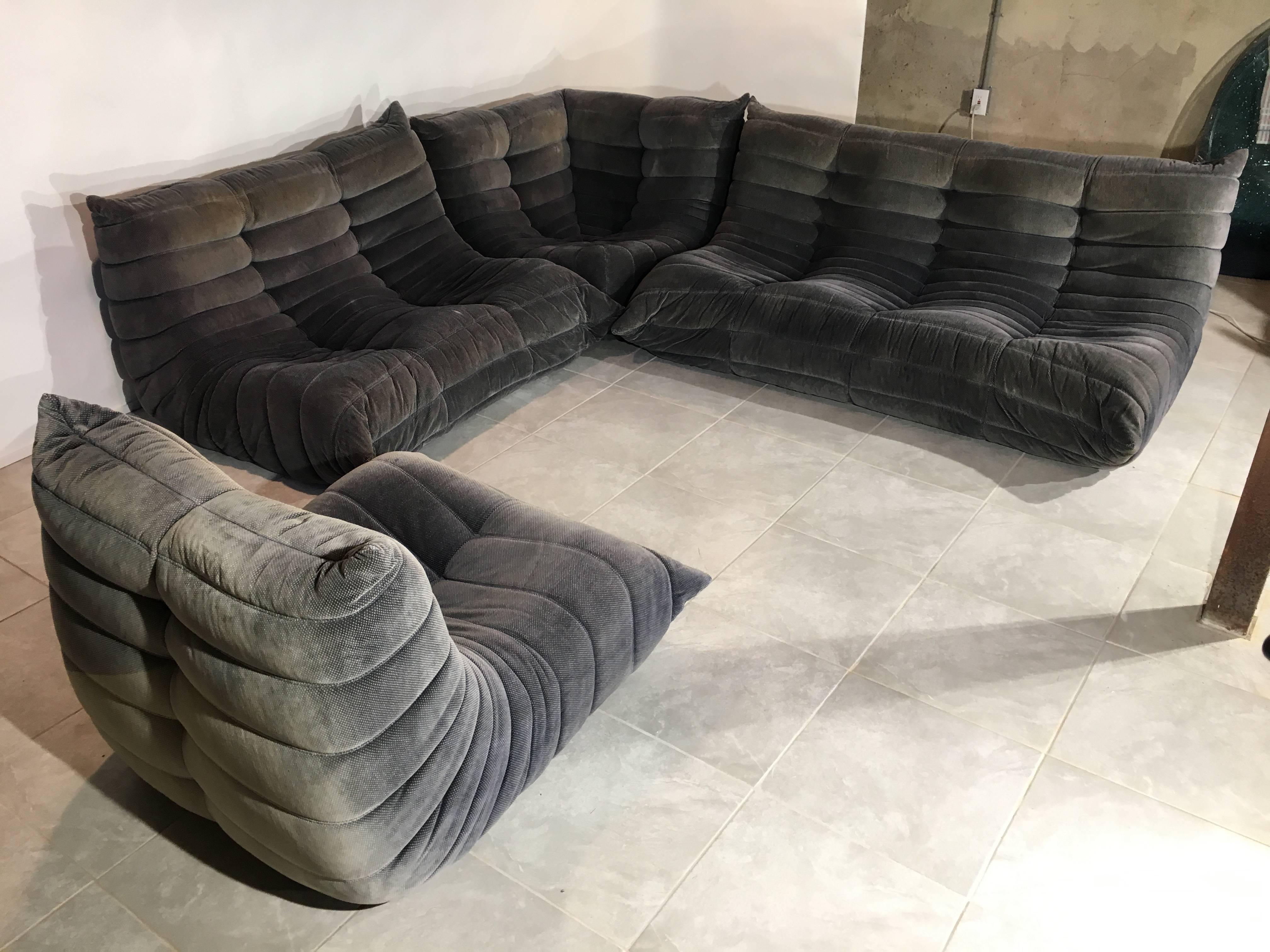 Michel Ducaroy and Lignet Roset legally licensed production of the famous Togo line to a company from Quebec, Canada by the name Ameublements Belus for a limited production two year run for North America. This is one of those sets.
Included are One