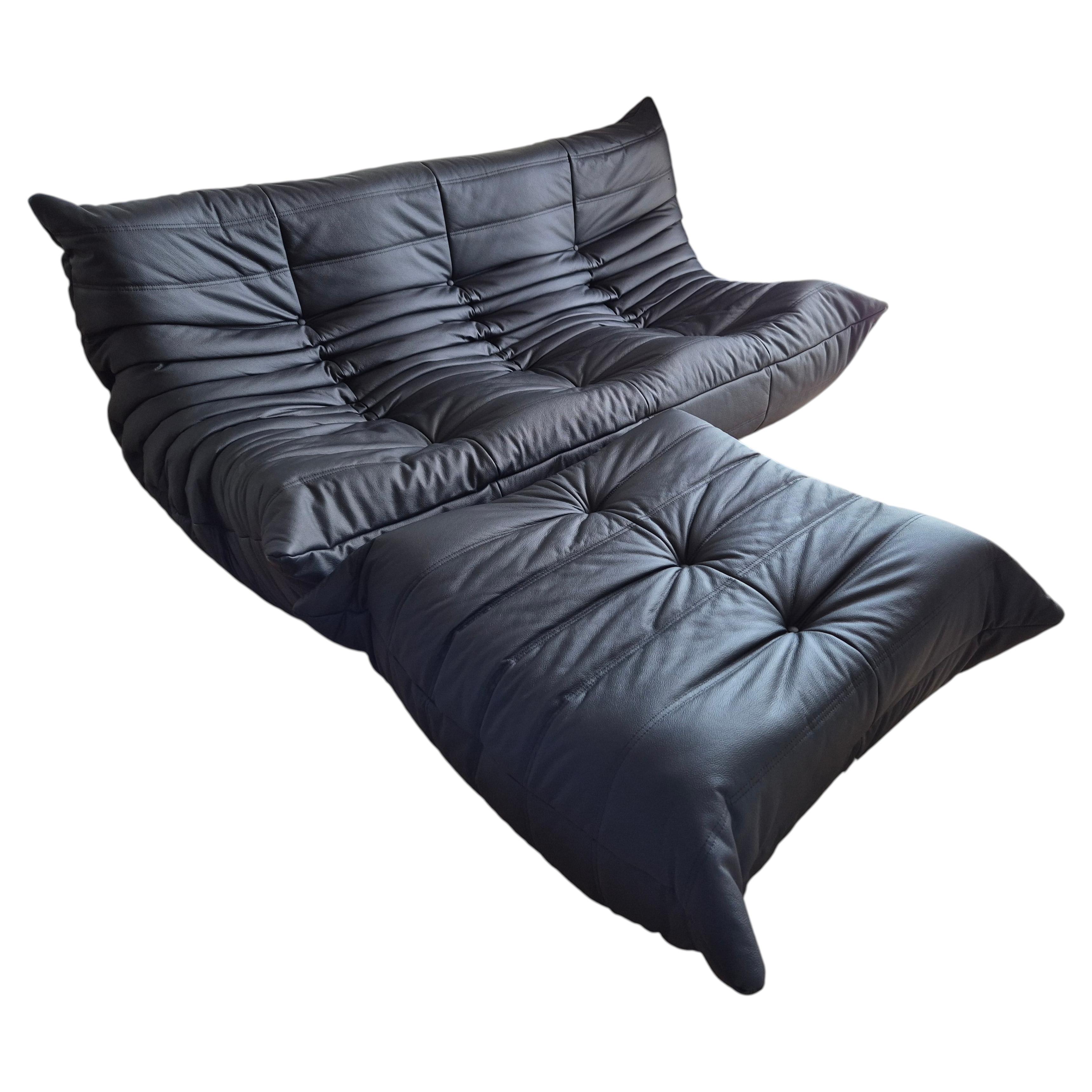 Michel Ducaroy for Ligne Roset Black Leather Togo Sofa and pouf, Set of 2