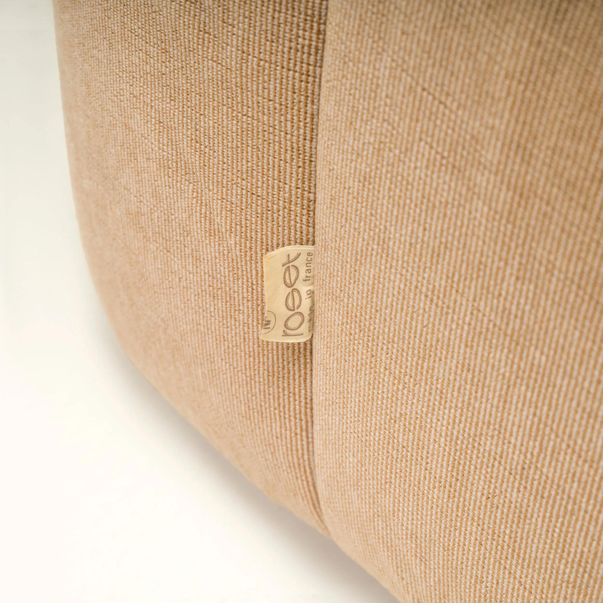 Designed by Michel Ducaroy for Ligne Roset, the Aralia sofa is similar in style to the iconic Togo and Kashima designs.

Built for laid back comfort, the two seat sofa is constructed solely from foam with a boxy silhouette and angled