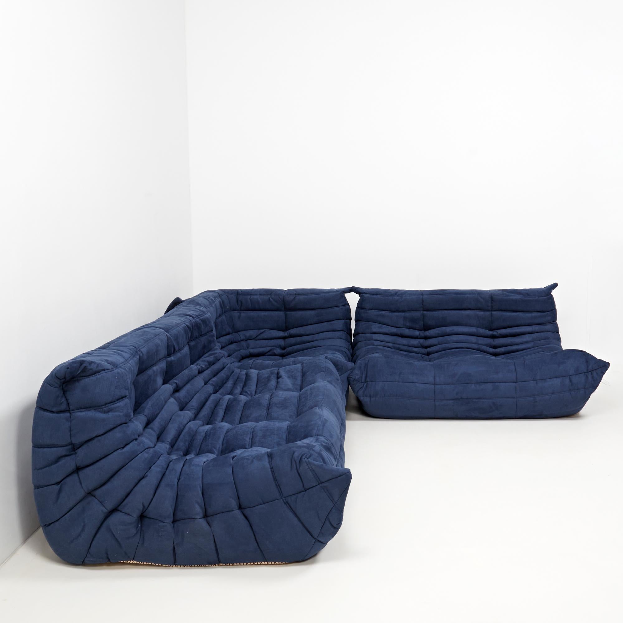 The iconic togo sofa set, originally designed by Michel Ducaroy for Ligne Roset in 1973, has become a design midcentury classic.

The sofas have been newly reupholstered in a soft dark blue coloured fabric. Made completely from foam, with three