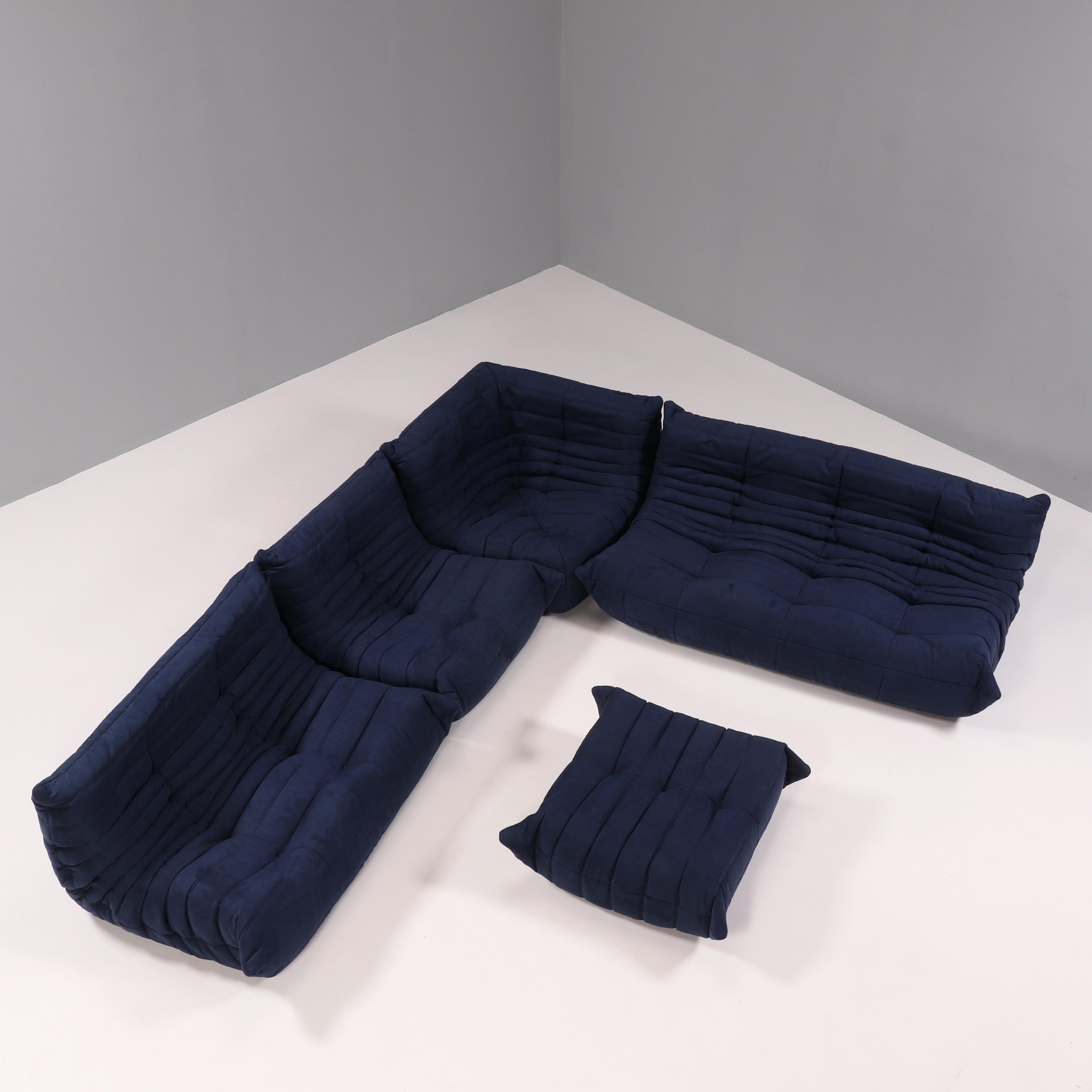The iconic Togo blue sofa set, originally designed by Michel Ducaroy for Ligne Roset in 1973, has become a design Mid Century Classic.

The sofas have been newly reupholstered in a soft dark blue fabric. Made completely from foam, with three
