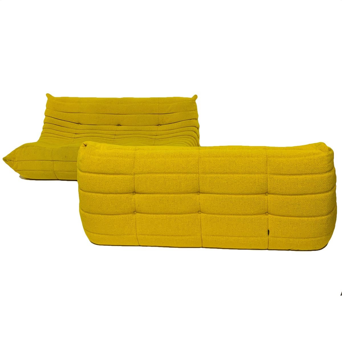 Rare color heavy weave yellow togo sofa designed by Michel Ducaroy for Ligne Roset. Very nice original condition. 3 available- priced per piece. These pieces can be used independently or lined up for one very long sofa. Last photo is from Ligne