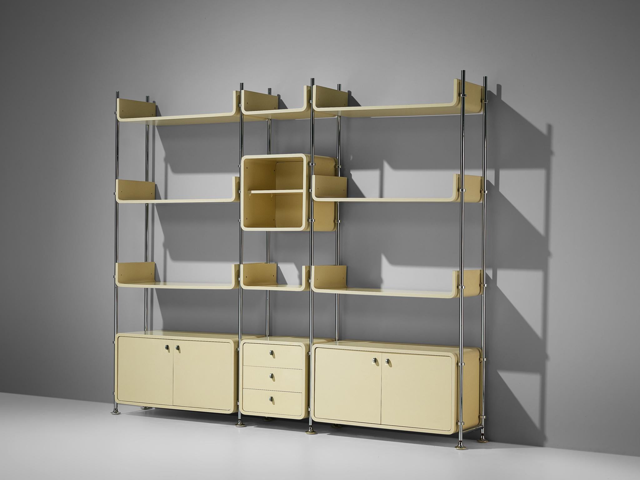 Michael Ducaroy, free-standing wall unit, steel, lacquered wood, France, 1970s

Michael Ducaroy designed this free-standing wall unit in the 1970s. In three columns are three closed cabinet, one open cabinet and eight shelves to find. The cream