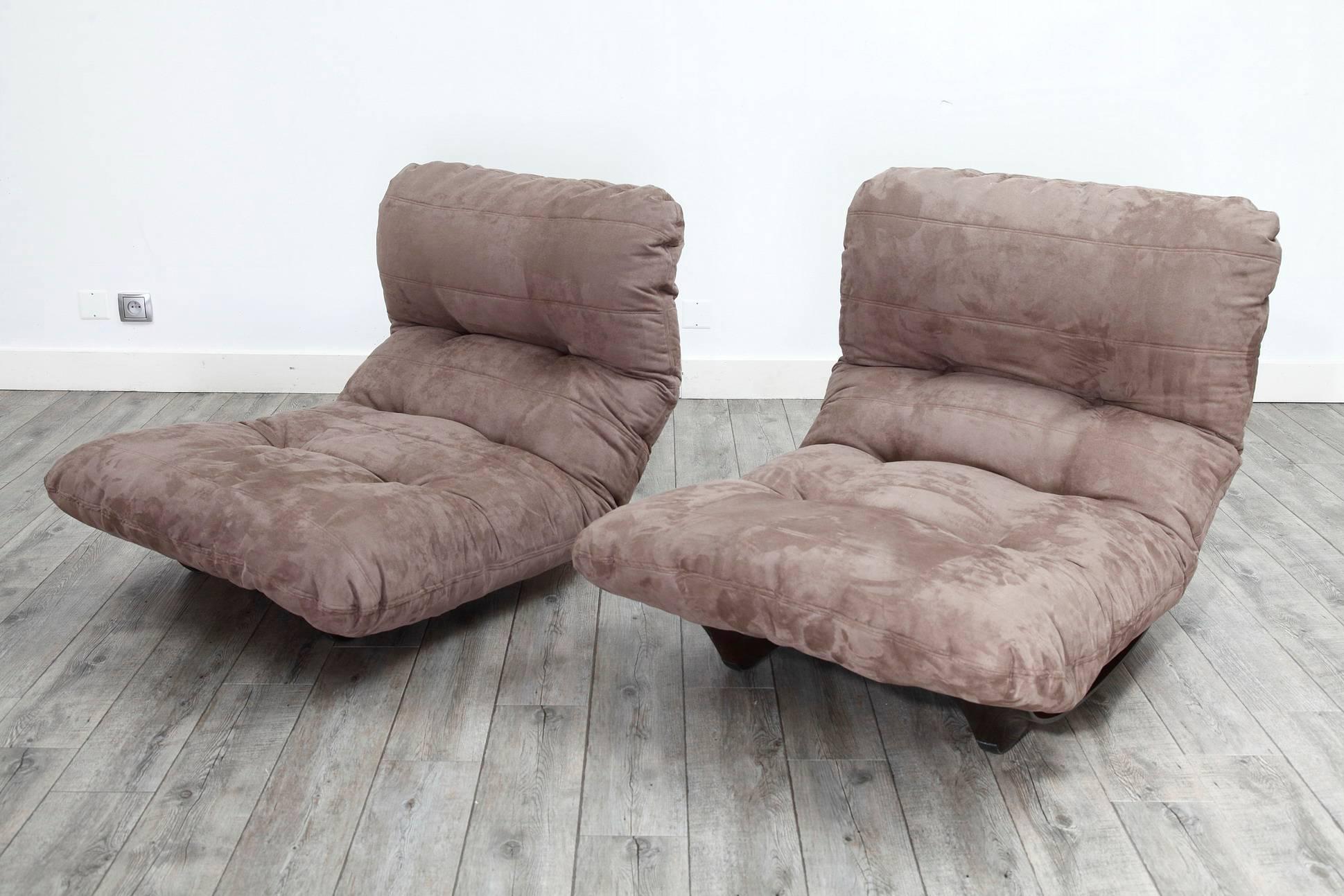 Two armchairs model Marsala designed by Michel Ducaroy (French, 1925-2011) and edited by Ligne Roset during the 1980s. It consists of a structure in brown thermoformed plexiglass and a removable cushion covered with mole grey fabric,

circa