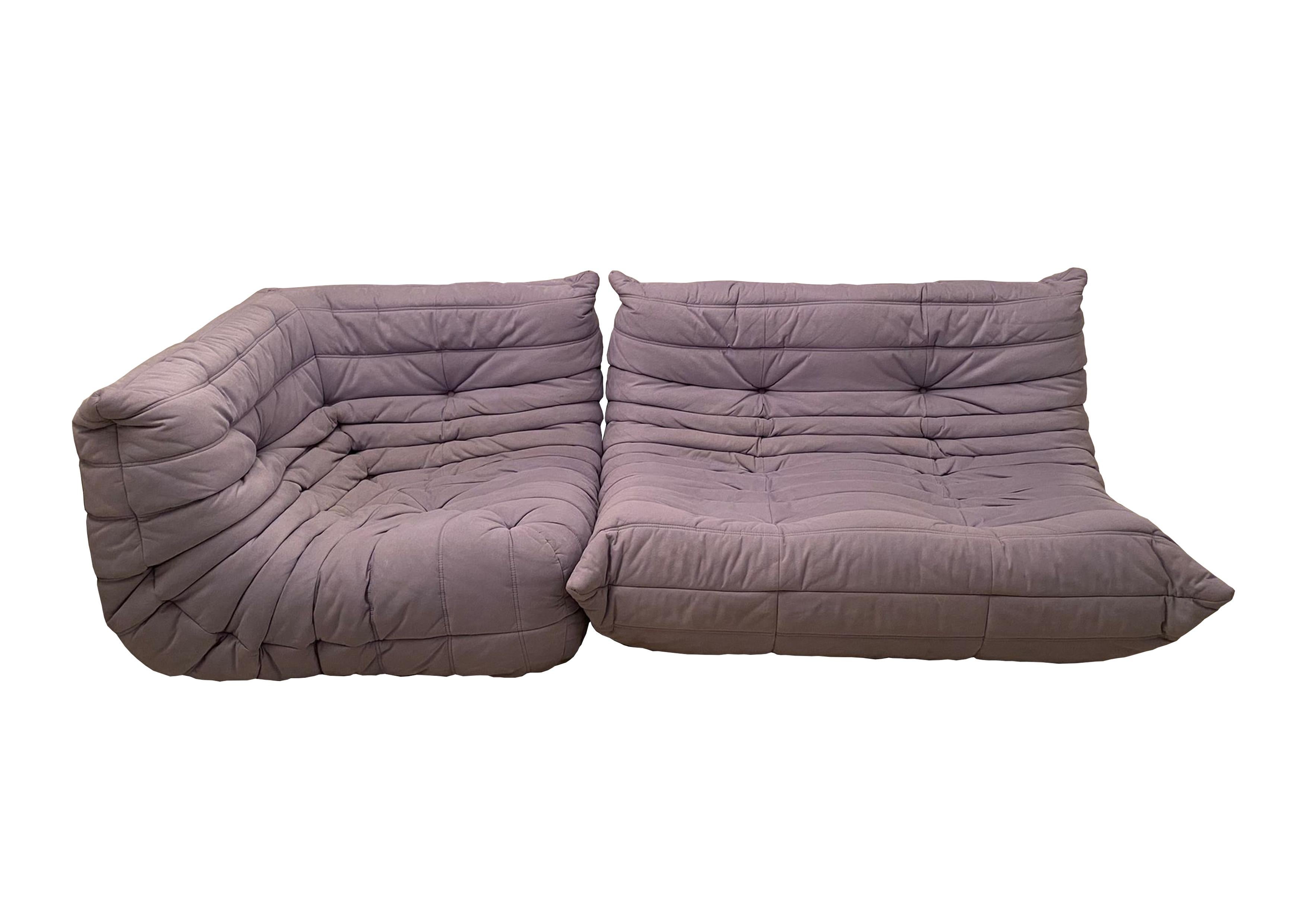 Togo modular sofa, designed by Michel Ducaroy and manufactured by Ligne Roset in 1974.
The set is composed of 2 modules.
Purple cotton upholstery.

Excellent vintage condition.
Possibility of custom re-upholstery.

The Togo sofa was presented