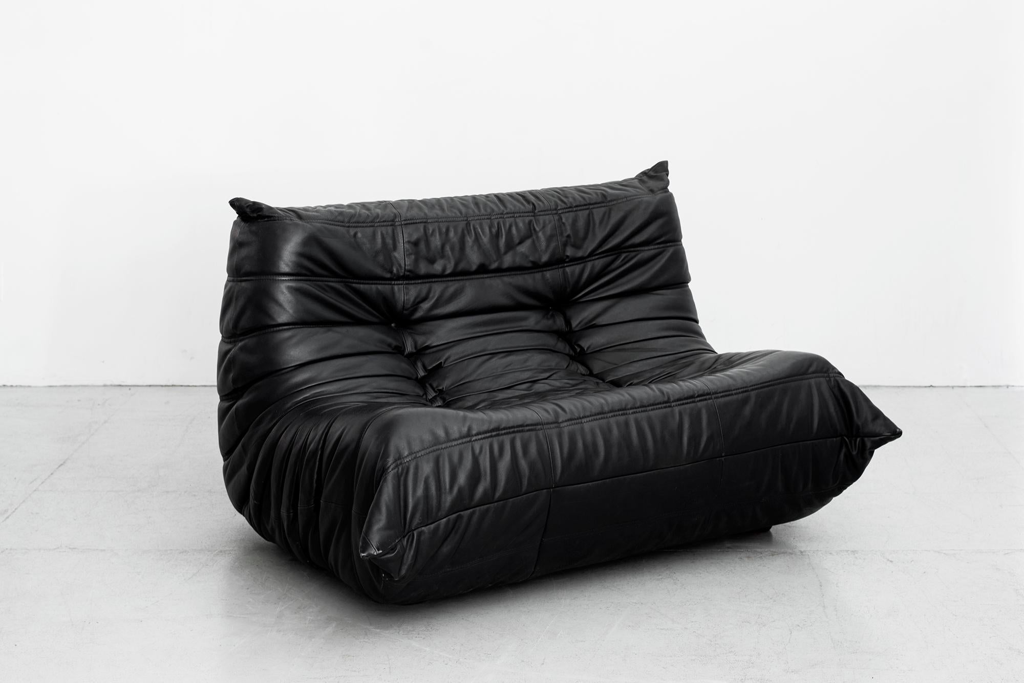 Black leather loveseat from the 