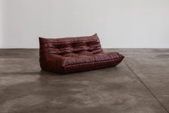 Divano a tre posti "Togo" di Michel Ducaroy per Ligne Roset, pelle bordeaux, 1973