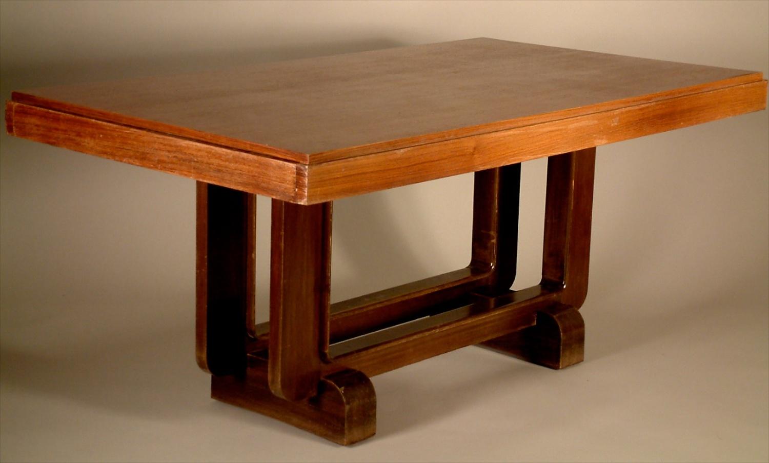 French Modernist Art Deco dining table in rosewood (top) and mahogany (base). 63
