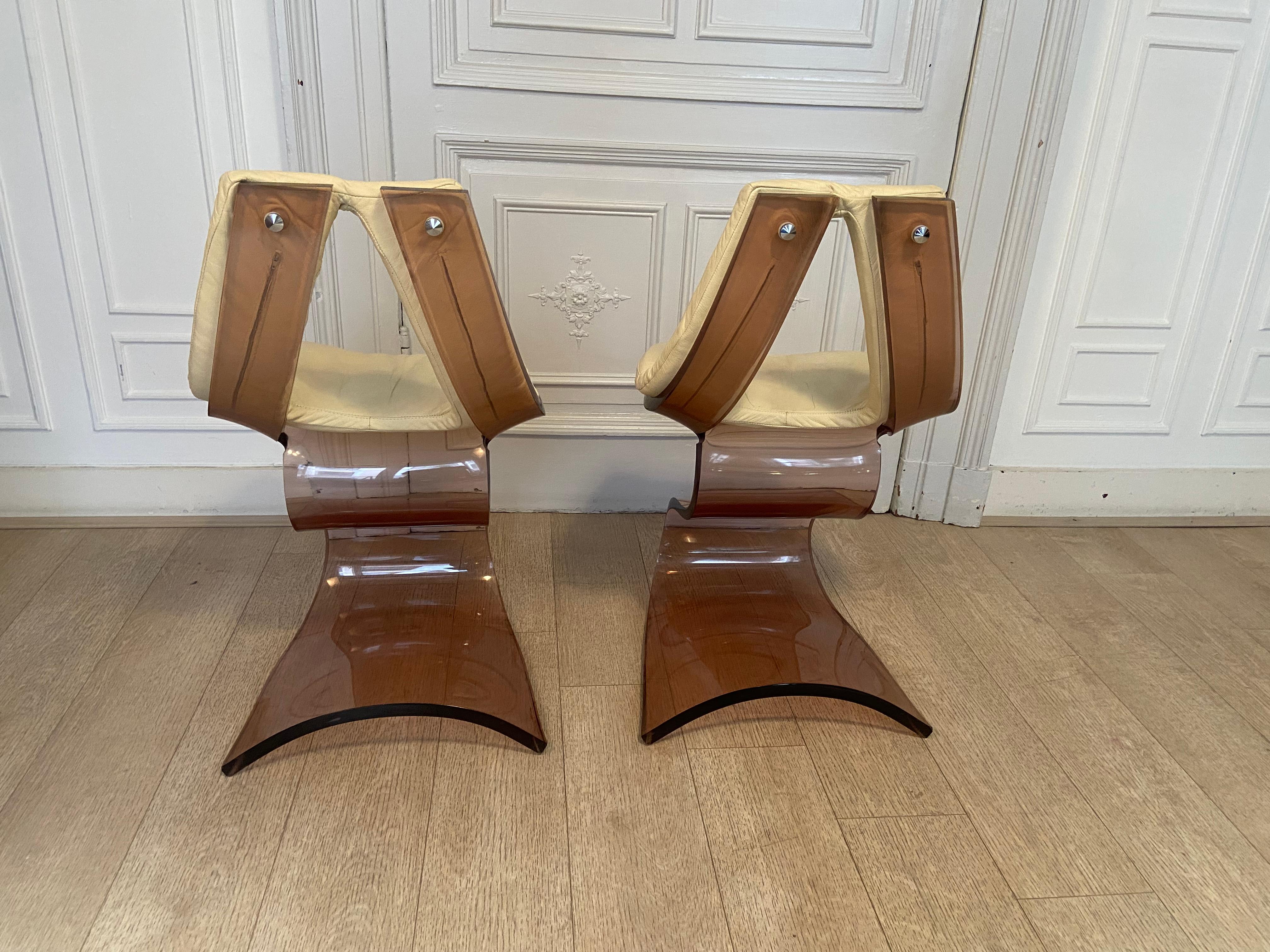 Michel Dumas chairs, plexiglass, 1970s.
