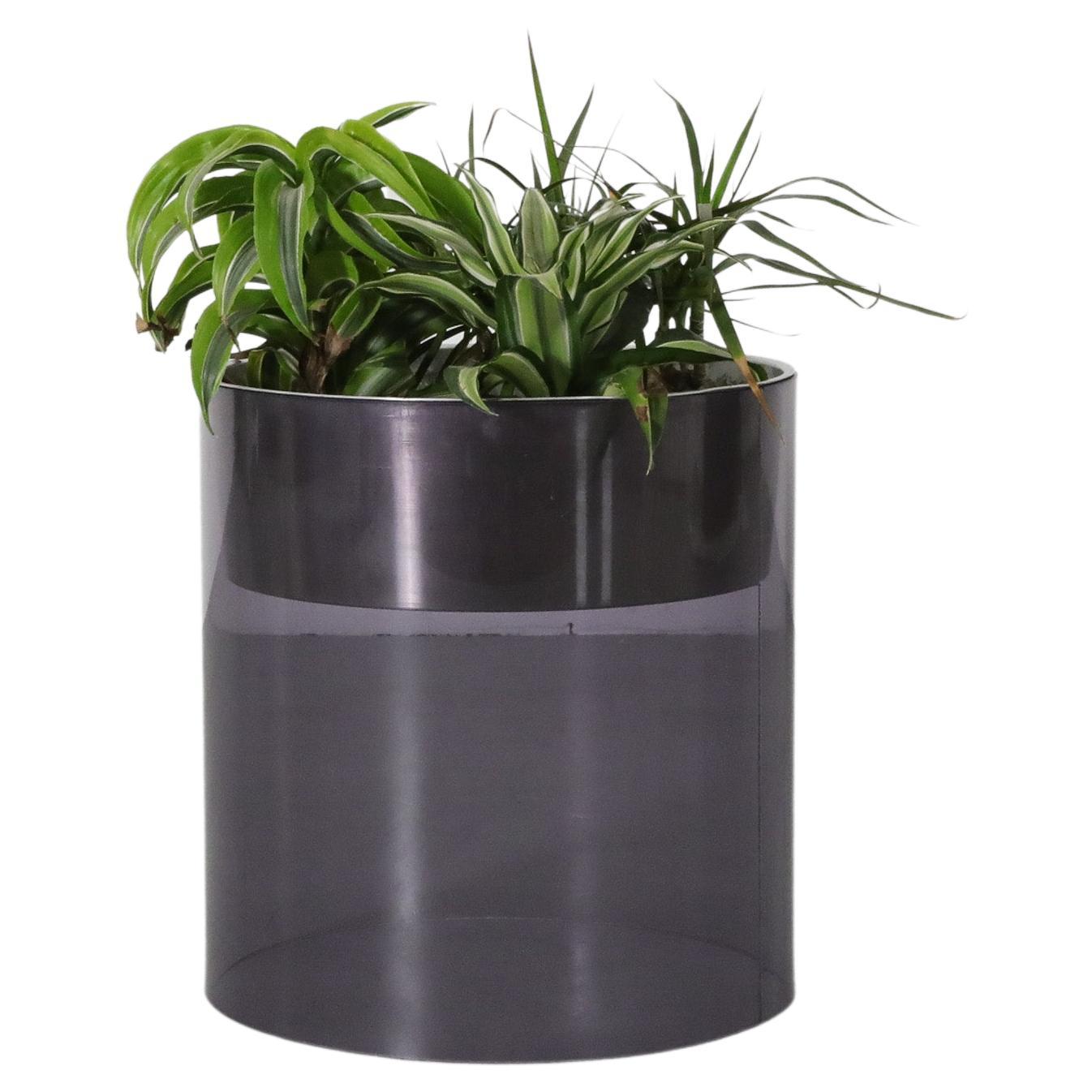 Michel Dumas per Roche Bobois Vaso in plexi fumé con piatto in alluminio incassato