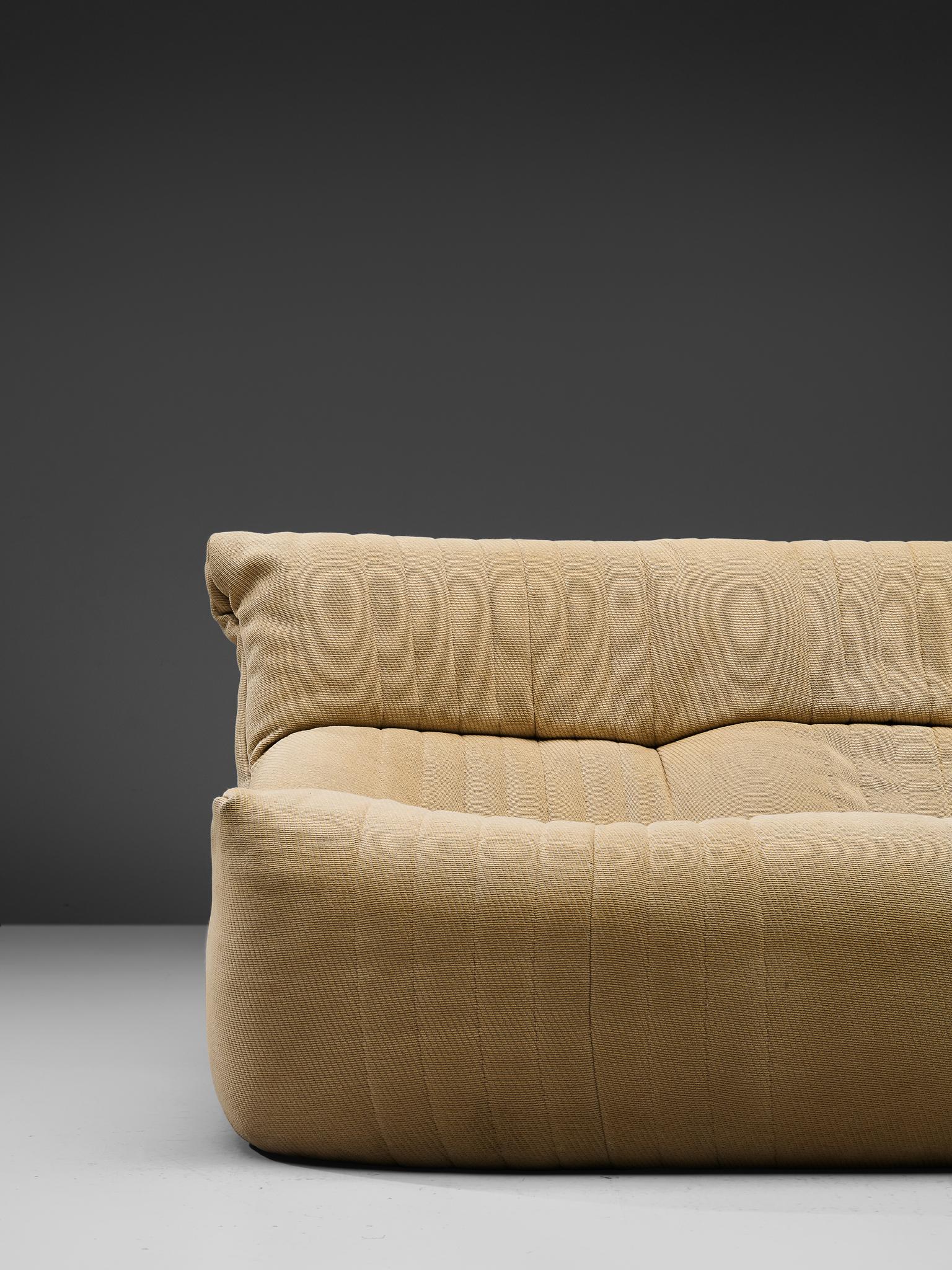 white fabric sofas