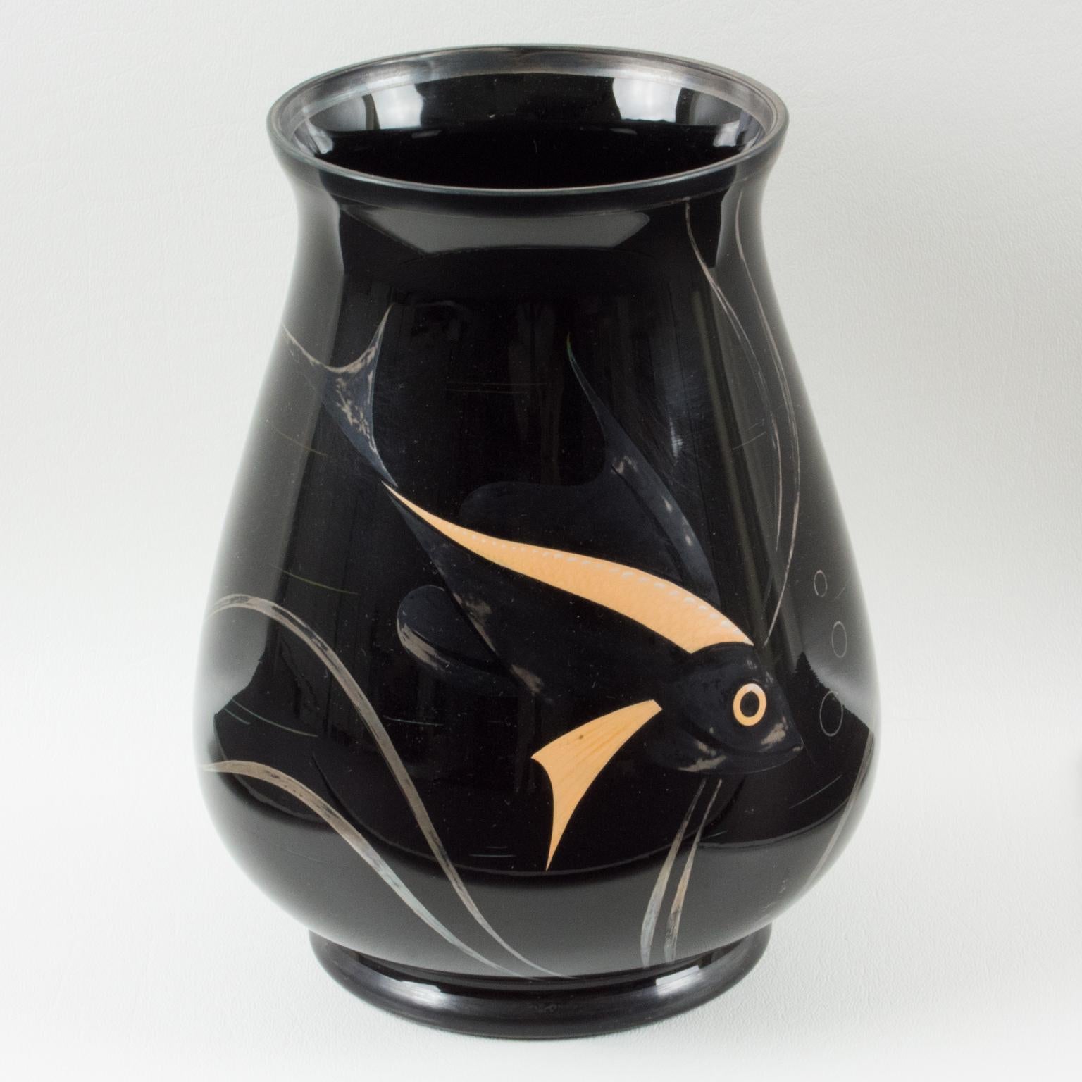 Verreries d'Art de HEM manufactured this elegant 1930s French Art Deco black glass vase on a design created by Michel Herman. The vessel boasts a silver and pink salmon color deposit decoration on one side to create an exotic fish design pattern.