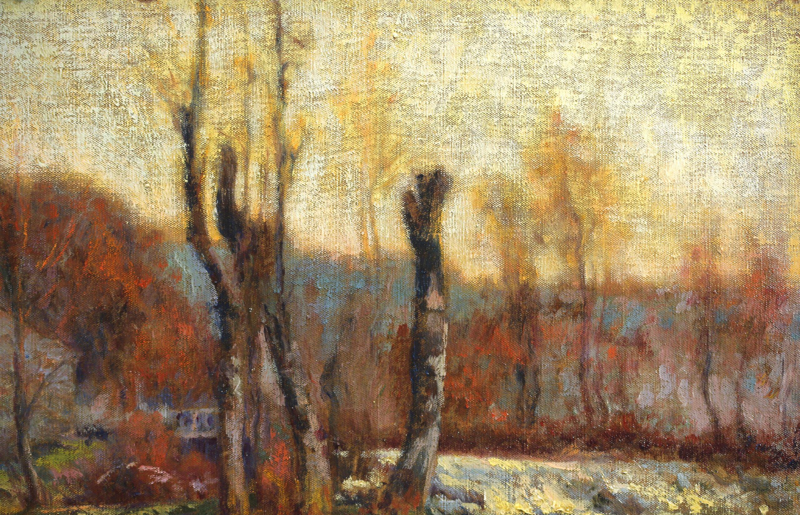Signed oil on canvas circa 1910 by French post impressionist painter Michel Korochansky. This autumnal landscape depicts a view of women washing linen on the bank of a river. The last light of the setting sun is illuminating the bricks of the