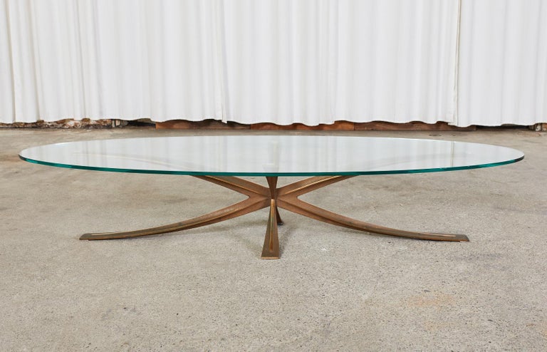 Hand-Crafted Michel Mangematin Oval Bronze Star Cocktail Coffee Table For Sale