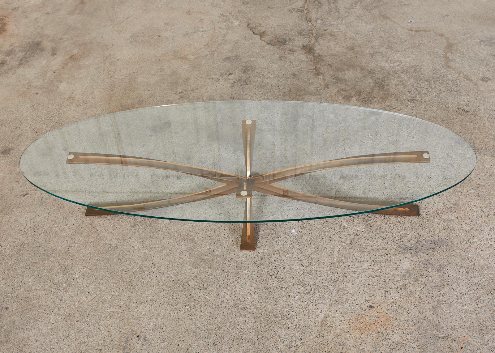 Hand-Crafted Michel Mangematin Oval Bronze Star Cocktail Coffee Table For Sale