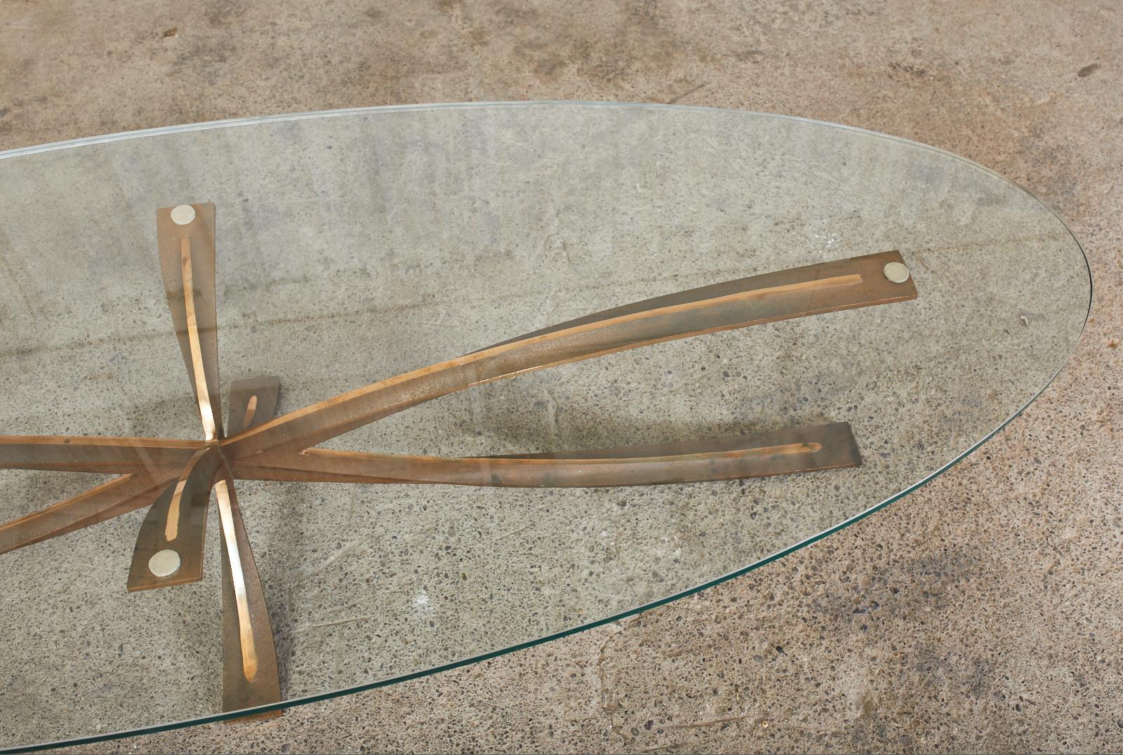 20th Century Michel Mangematin Oval Bronze Star Cocktail Coffee Table For Sale