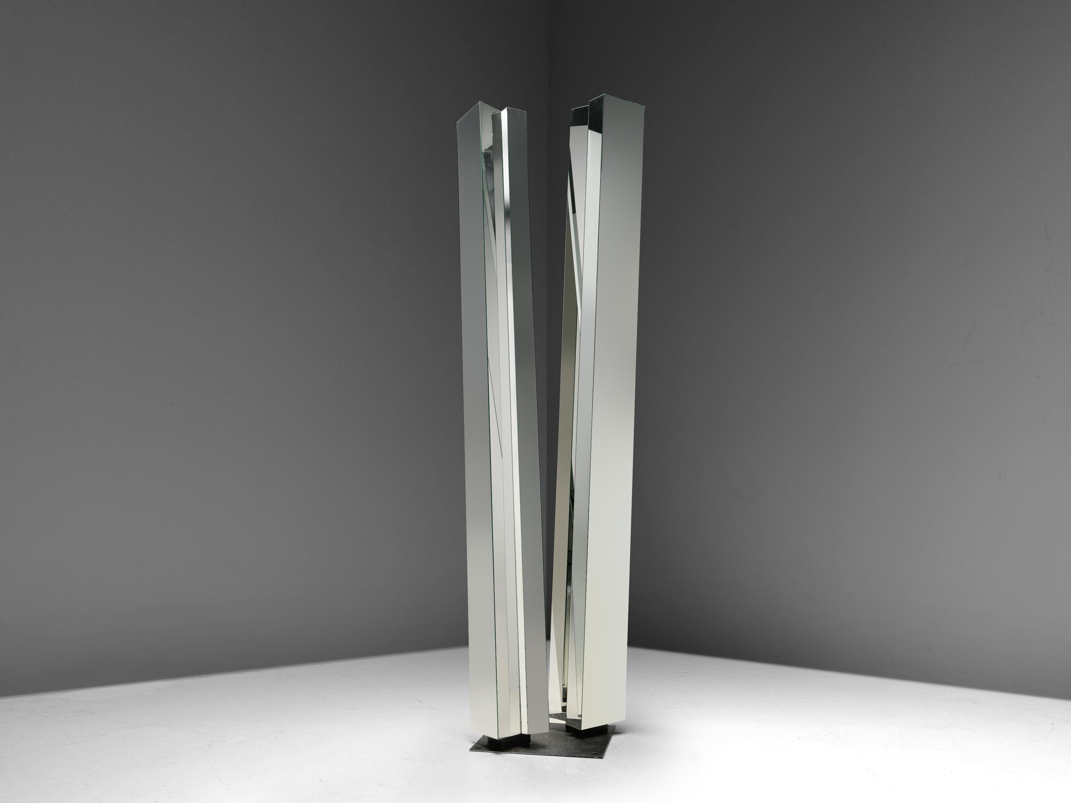 Michel Martens, sculpture, mirrored glass, metal Belgium, 1970s

Belgium artist Michel Martens is famous for his impressive glass art. He created this postmodern piece of art in the 1970s. Two columns rise up from a small metal squared plate. The