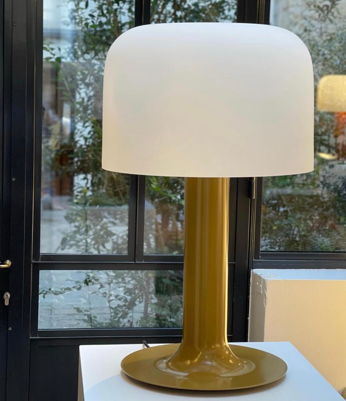 Michel Mortier 10497 metal and glass table lamp for Disderot in chamois.

Originally designed in 1972, this sculptural table lamp is a newly produced numbered edition with an authentication certificate. Made in France by Disderot with many of the