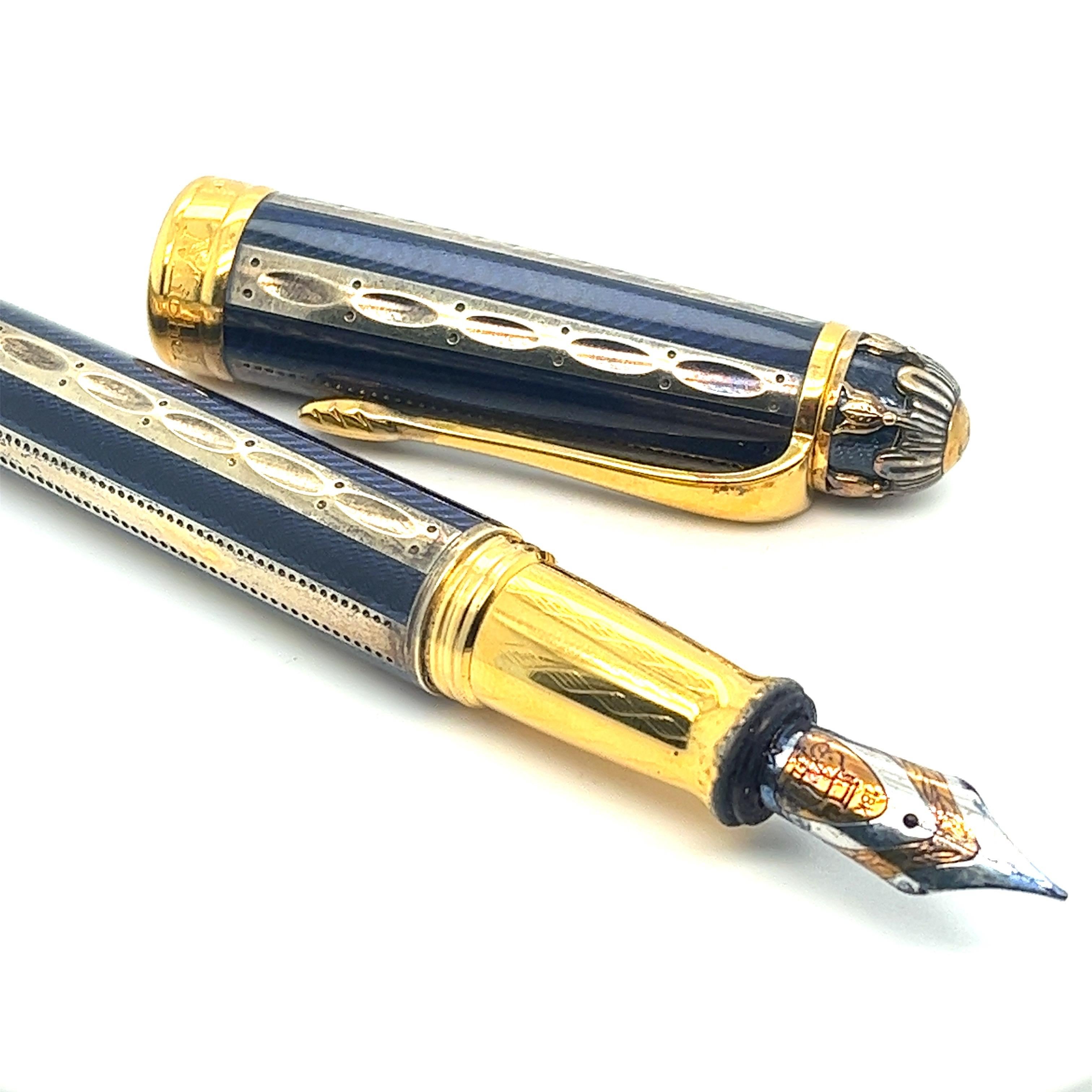 Offered here is a Michel Perchin Pen.

Sterling silver gilt and enamel fountain pen, made in Germany. 0728/4321.

in great condition, intriguing decorations and Imperial Russian ribbed blue enamel.
Just like the imperial faberge eggs.