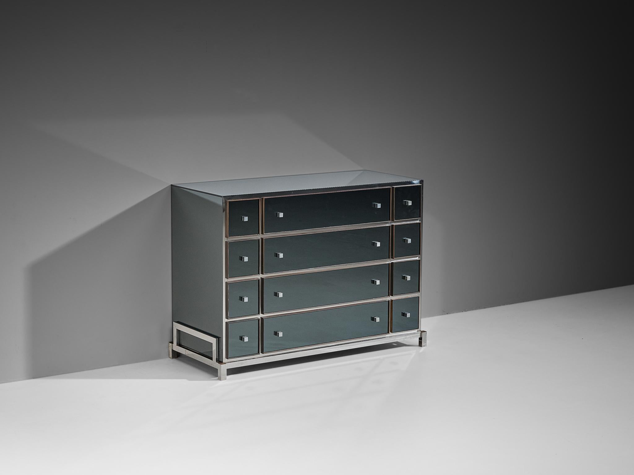 Michel Pigneres, chest of drawers, brass, chrome-plated steel, mirrored glass, France, 1970s

This exquisite cabinet is beautifully designed featuring a nice structure of sharp lines and geometrical shapes. This item is exemplary for refined, highly