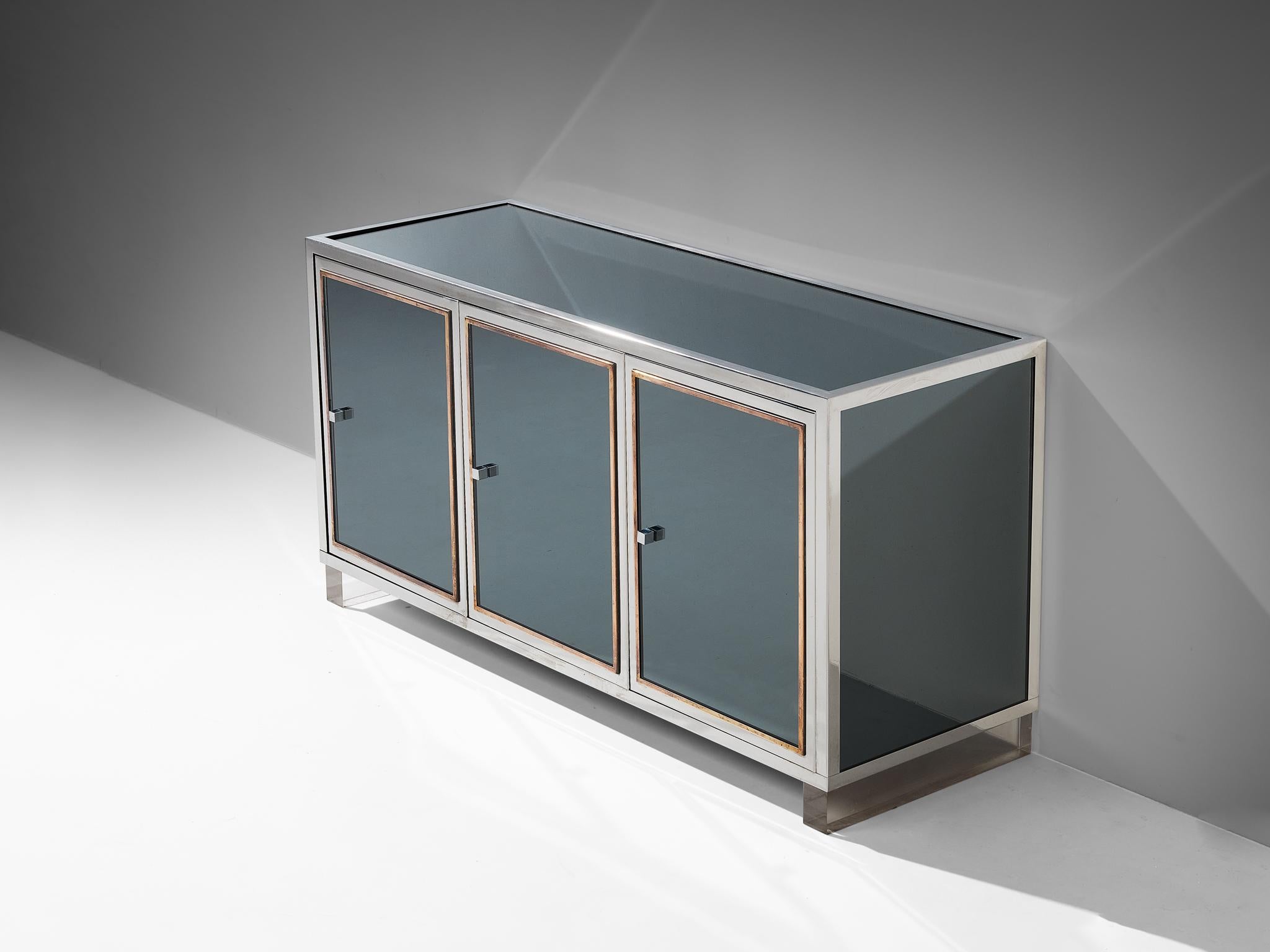 Michel Pigneres, sideboard, brass, chrome-plated steel, mirror, France, 1960s

This exquisite sideboard is beautifully designed by Michel Pigneres in the 1960s. It is featuring a nice structure of sharp lines and geometrical shapes. This item is