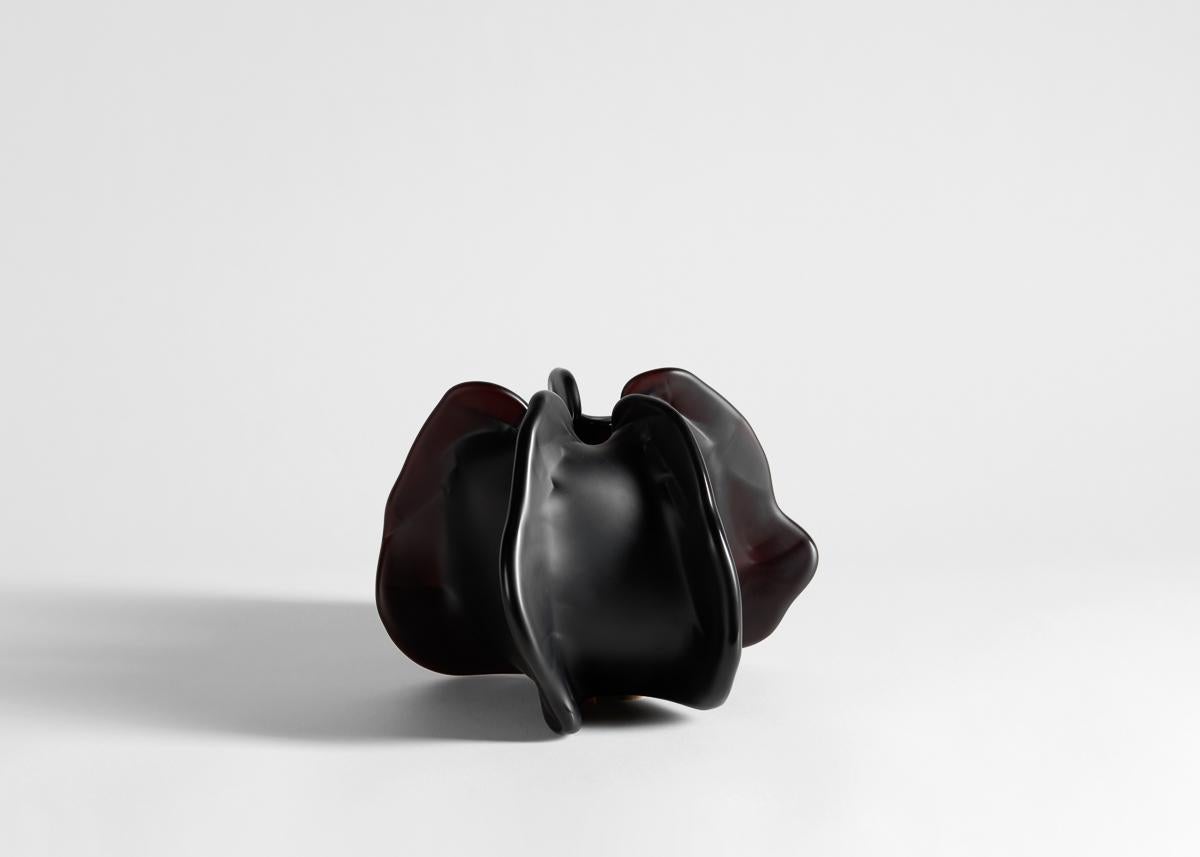 Naturalia consists of nine one-off pieces in amber and dark burgundy, expressing Michela Cattai’s fascination with nature in all of its unpredictable forms and manifestations. Each piece was crafted in Murano, with the traditional venetian blown