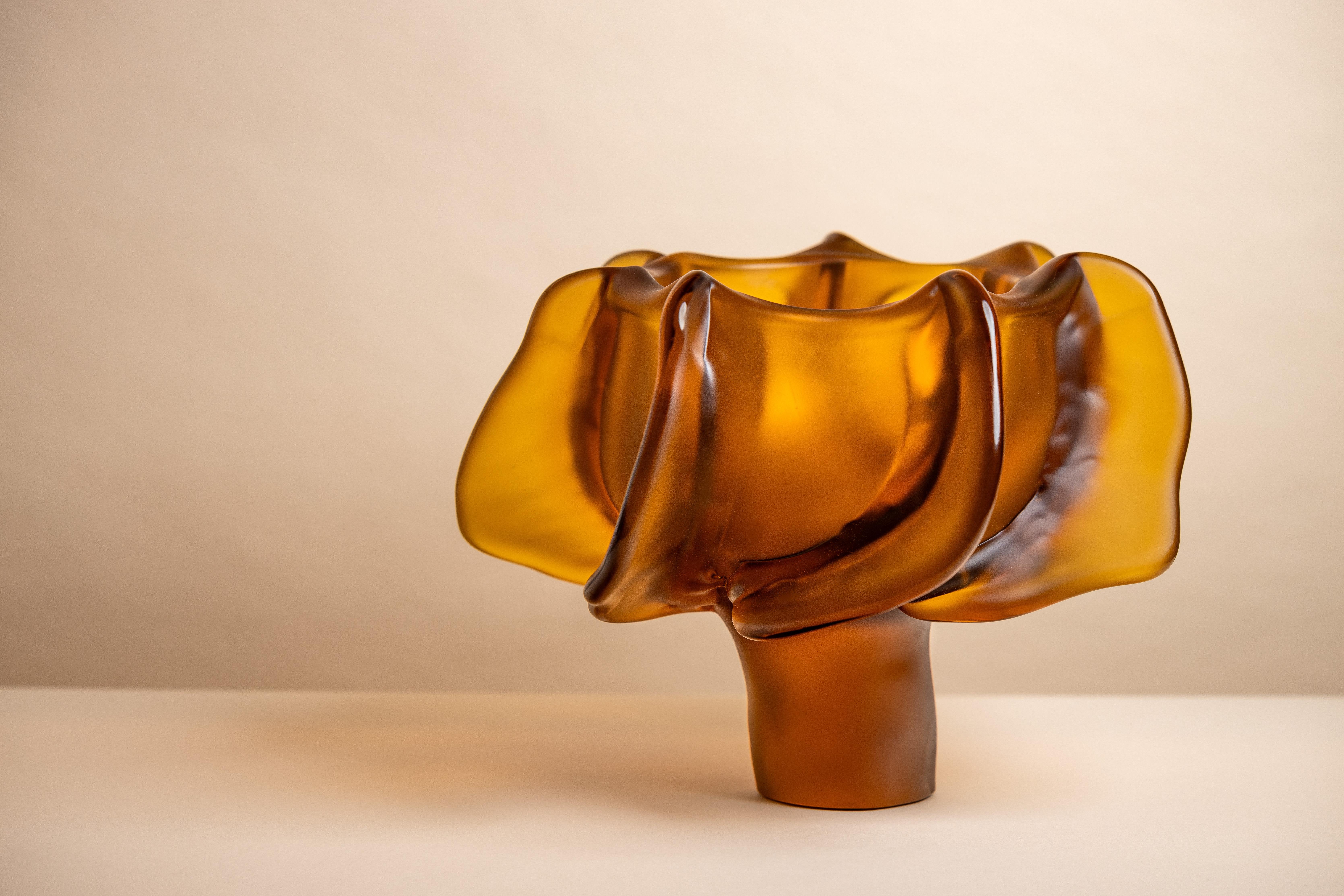 Naturalia consists of one-off pieces in amber, gold, dark burgundy, and hydrangea, expressing Michela Cattai’s fascination with nature in all of its unpredictable forms and manifestations. Each piece was crafted in Murano, with the traditional