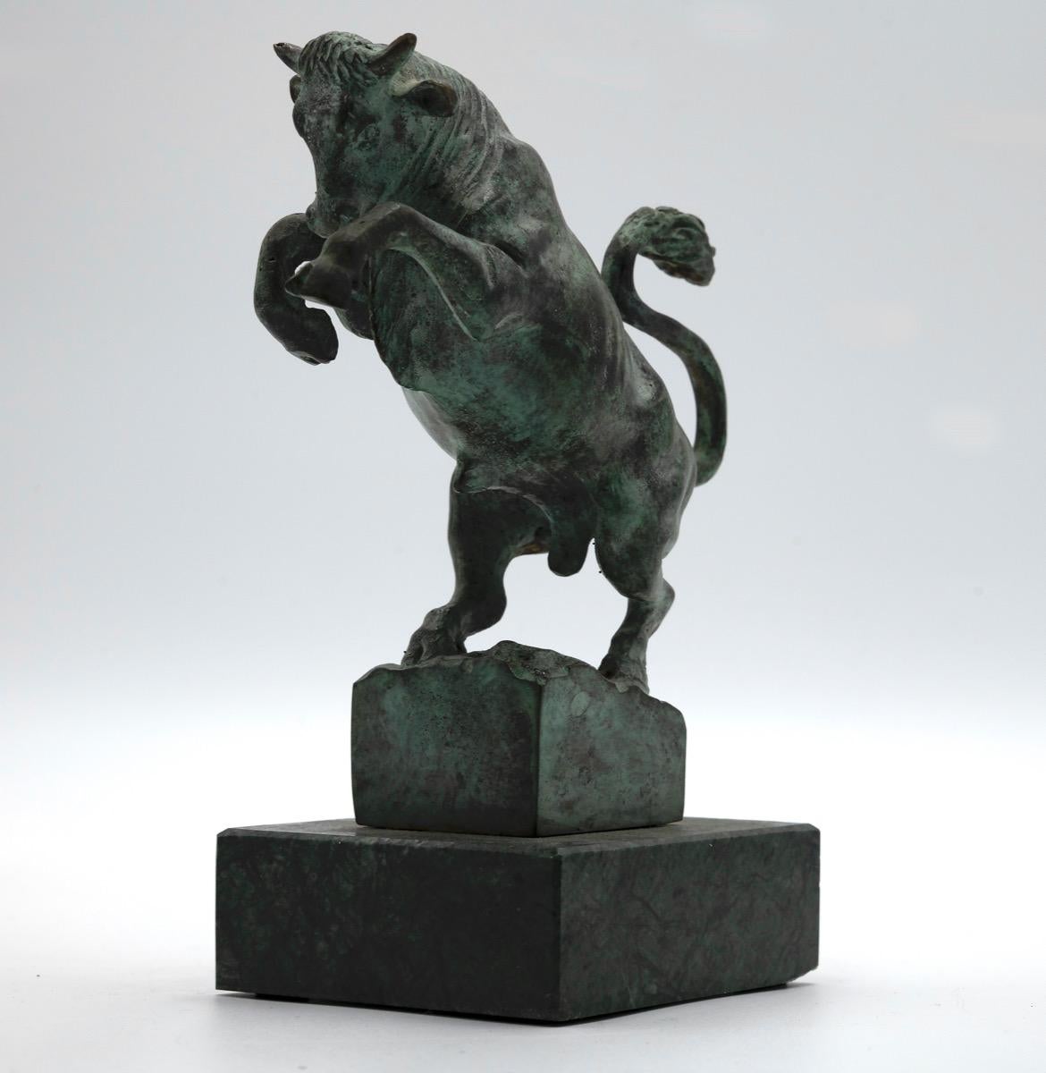 Bull is a beautiful bronze decorative object realized in the middle of the 20th Century after the italian sculptor Michelangelo Monti.

The piece has a marble base 3x9x7,5 cm.

Good condition, signs of oxidation.