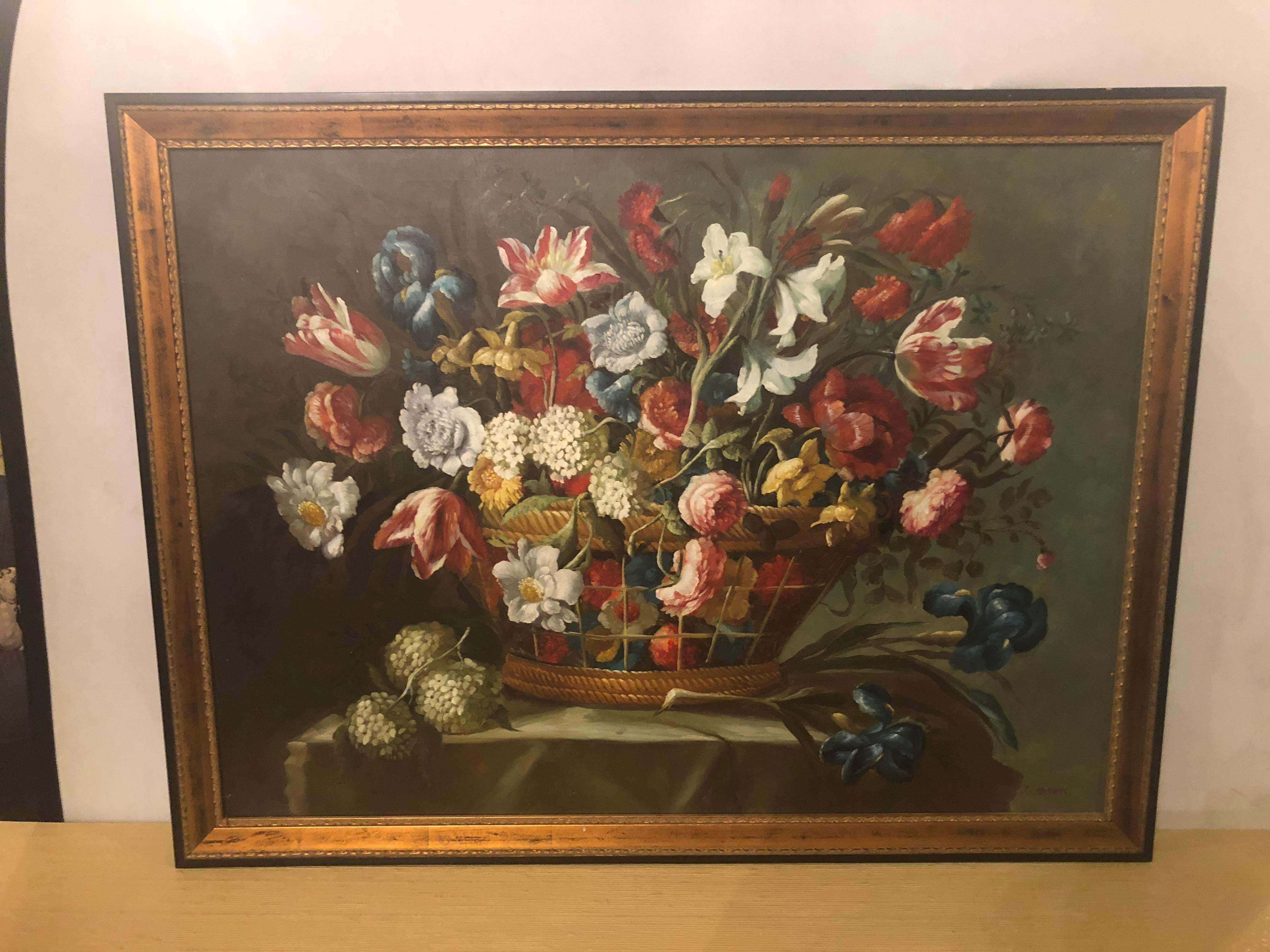 A beautiful large still life flowers bouquet oil on canvas painting in the style of Michele Antonio Rapos  (Turin 1733-1819) The piece of art features a dark deep green background and earthy toned colors. The frame is made of wood and painted in a