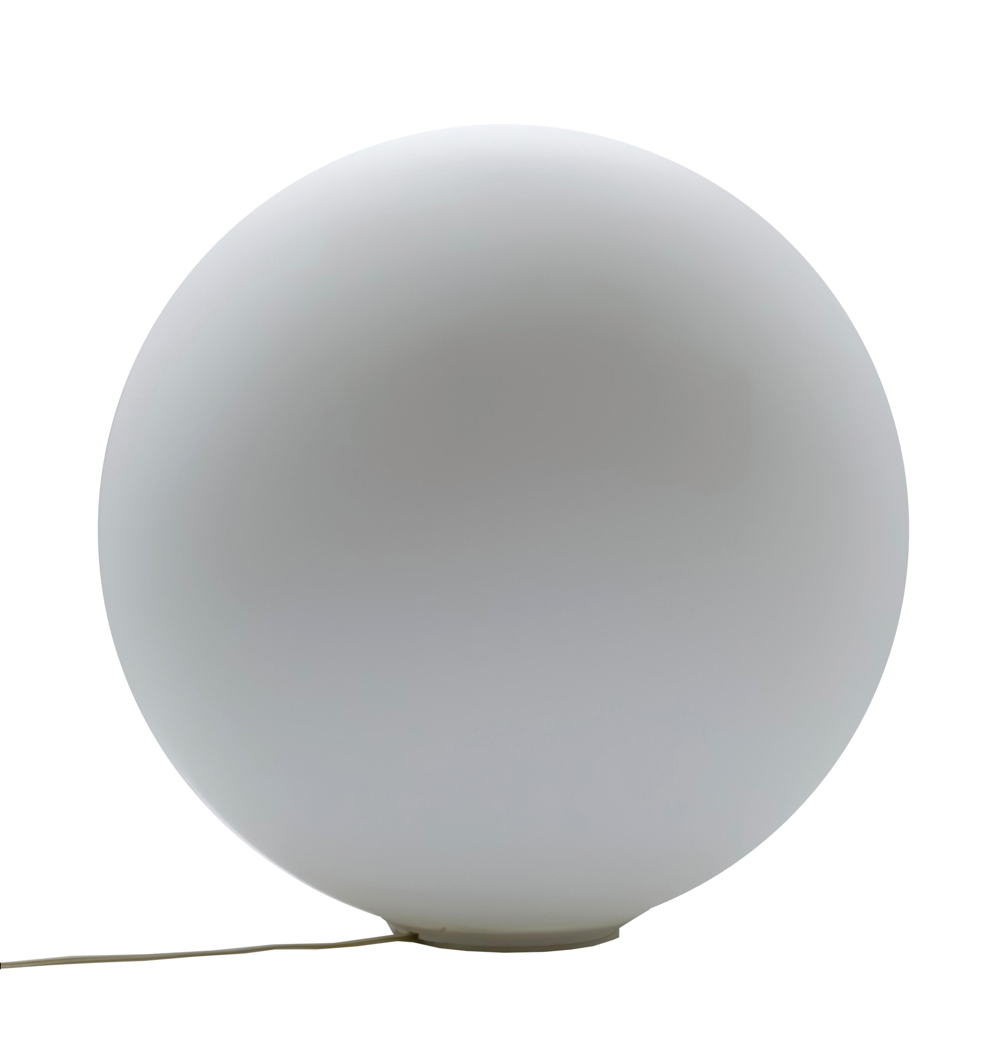 Dioscuri table or floor lamp with a diameter of 42 cm made of blown opaline etched glass and a steel and thermoplastic resin base. Unusual and striking, the lamp provides diffused, dimmable light that is perfect for modern interiors. Designed by