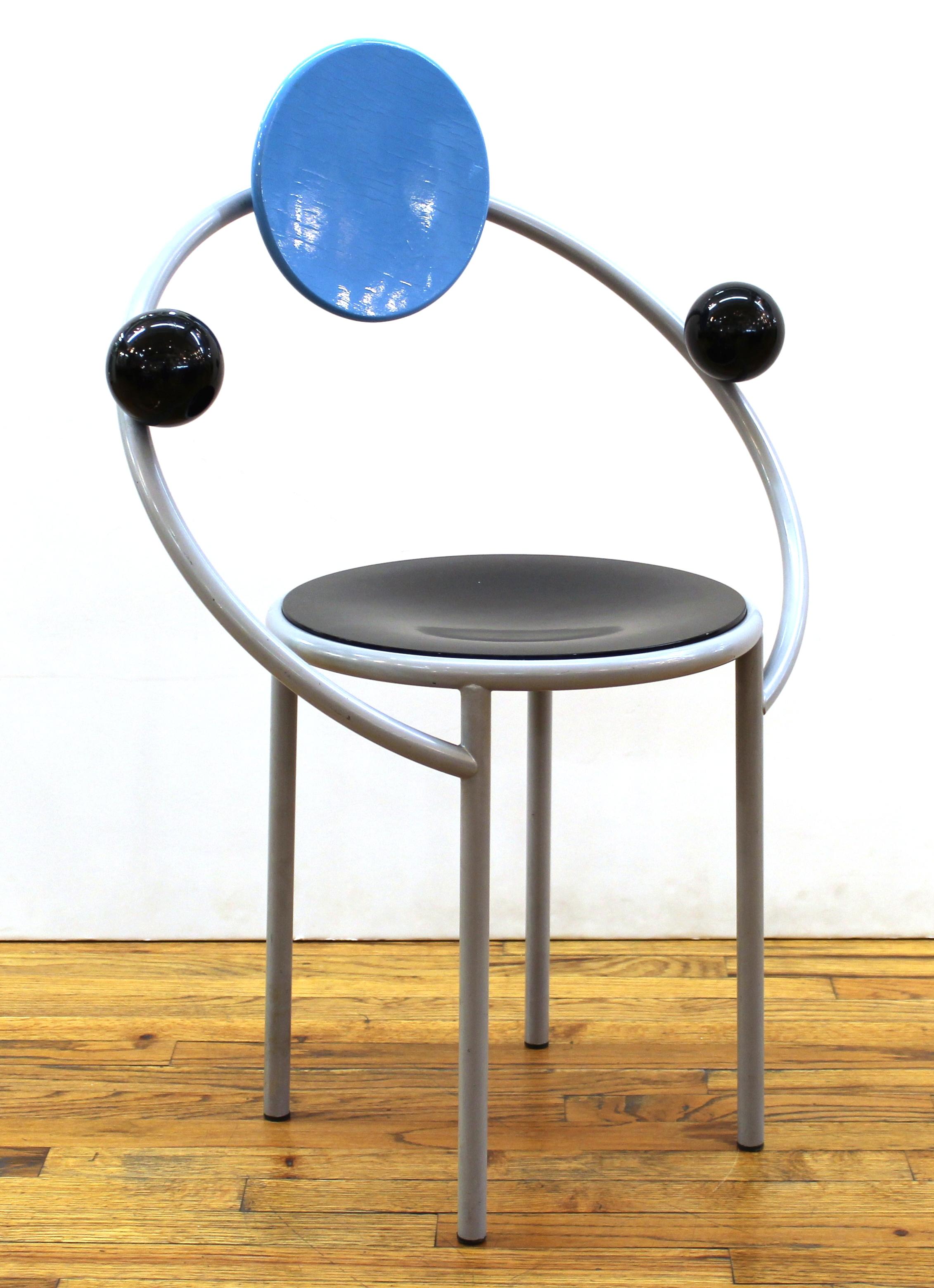 Michele de Lucchi Italian Postmodern Memphis 'First Chair' in enameled steel, lacquered wood back rest and ball armrests, made in circa 1983. Stenciled manufacturer's mark to underside. Measures: 35.5